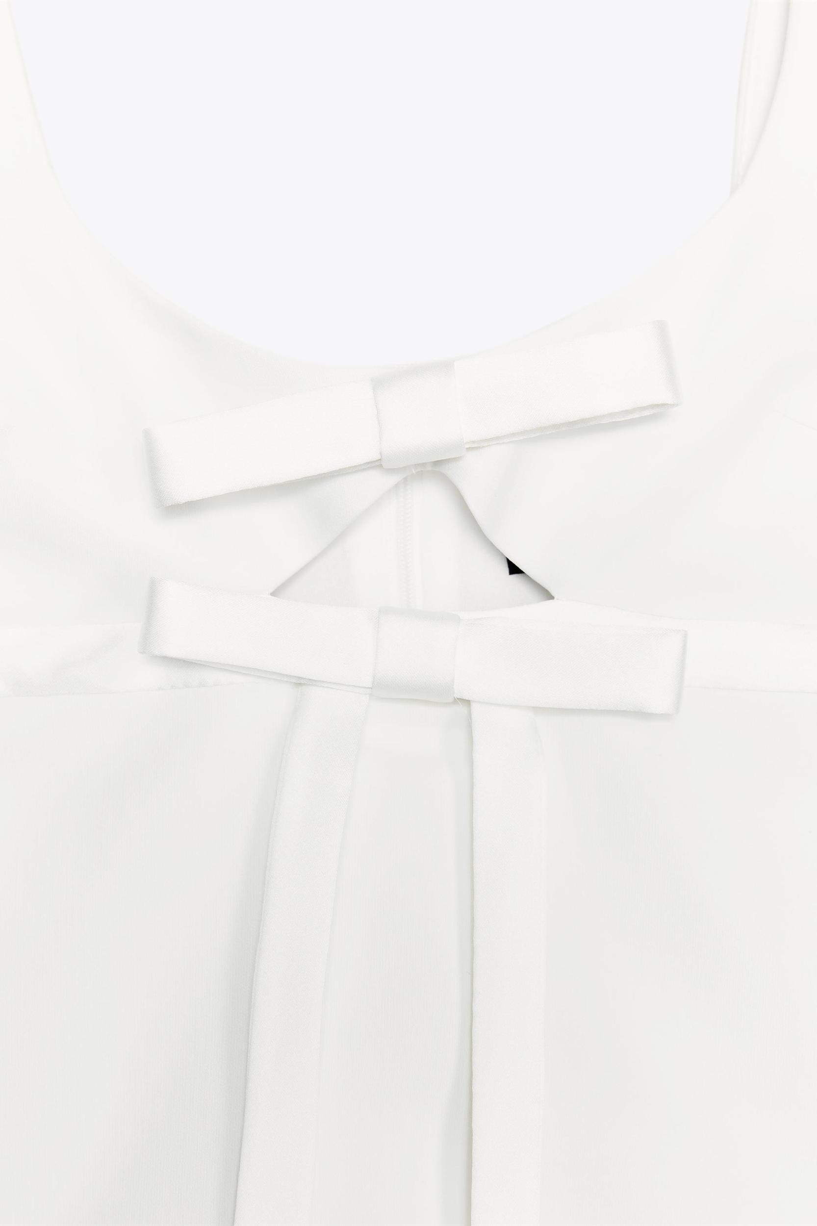 CUT OUT TIE TOP Product Image