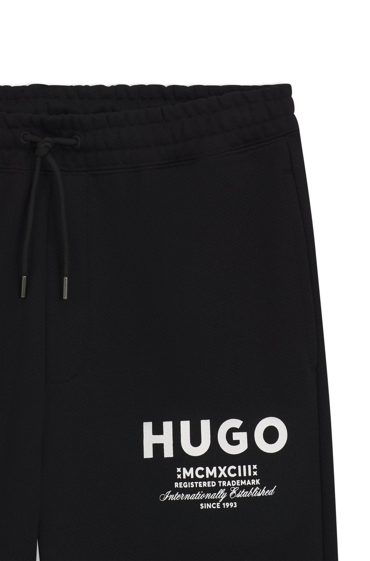 Cotton-terry tracksuit bottoms with logo print Product Image