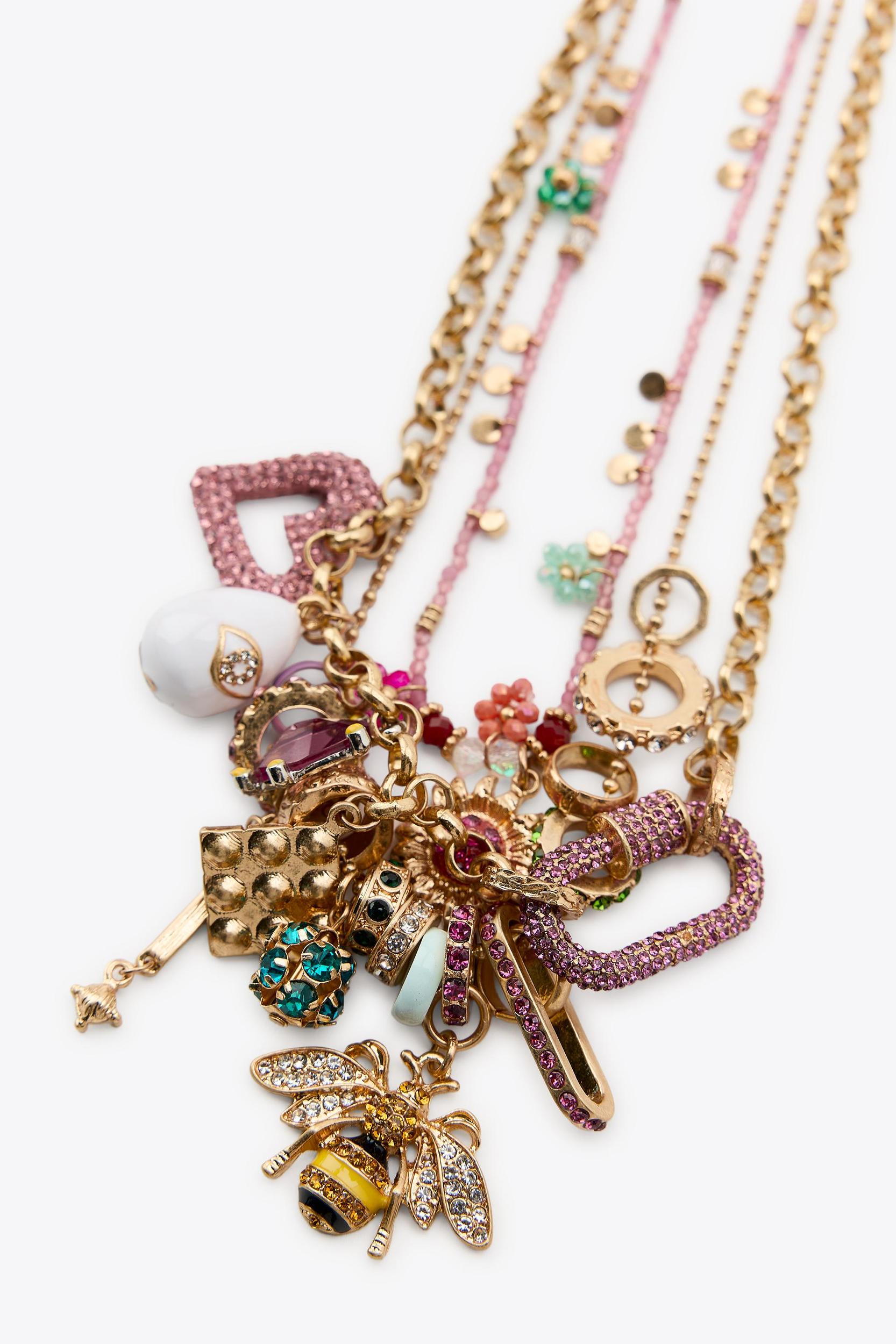 METALLIC THREAD ASYMMETRIC TOP Product Image