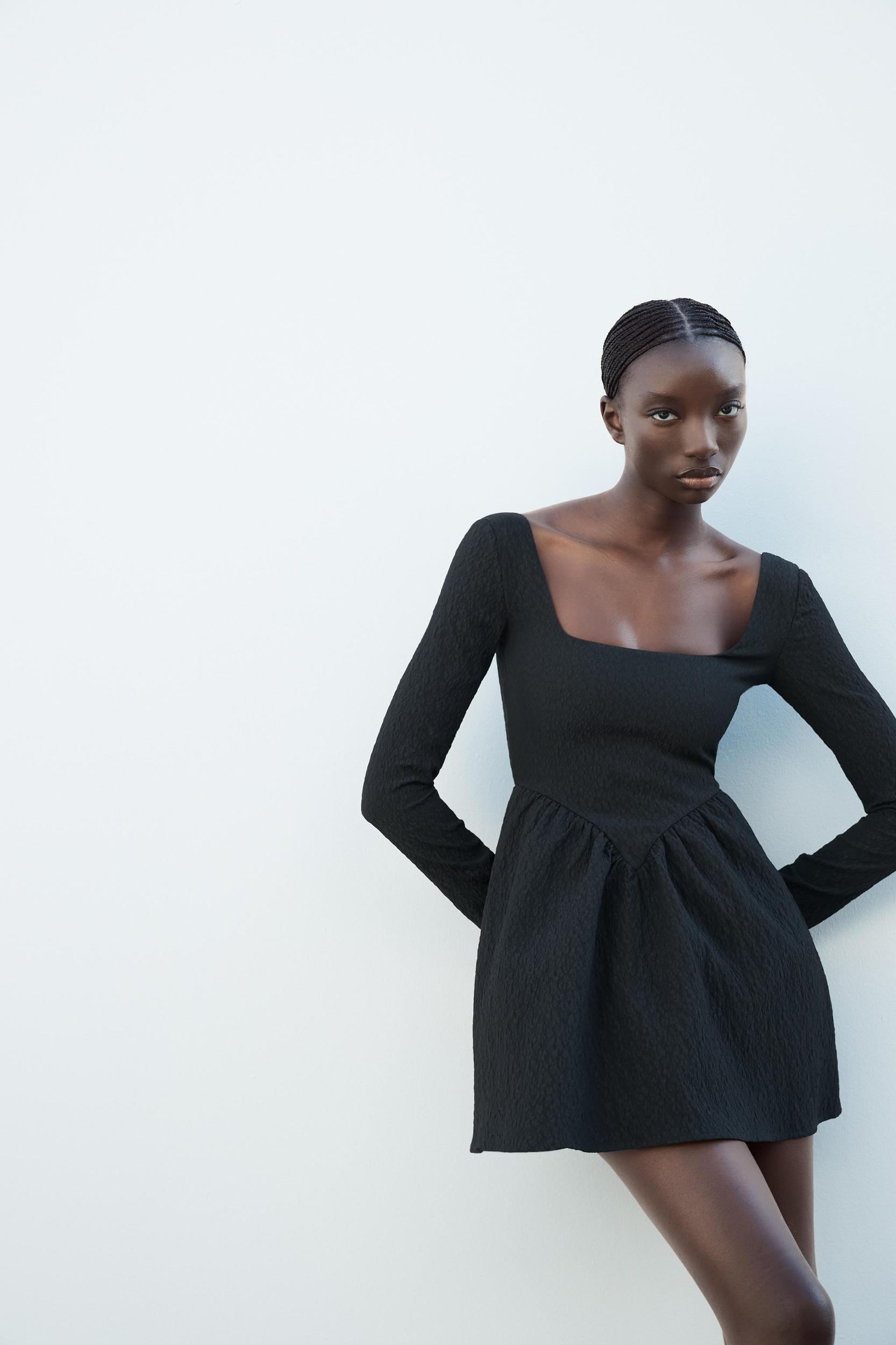 TEXTURED DRESS WITH VOLUME Product Image