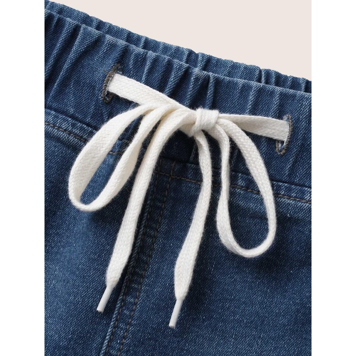 Plus Size Dark Wash Drawstring Distressed Patch Pocket Denim Shorts Women Darkindigo Distressed Medium stretch Everyday Patch pocket Casual Denim Shorts BloomChic 24/3X Product Image