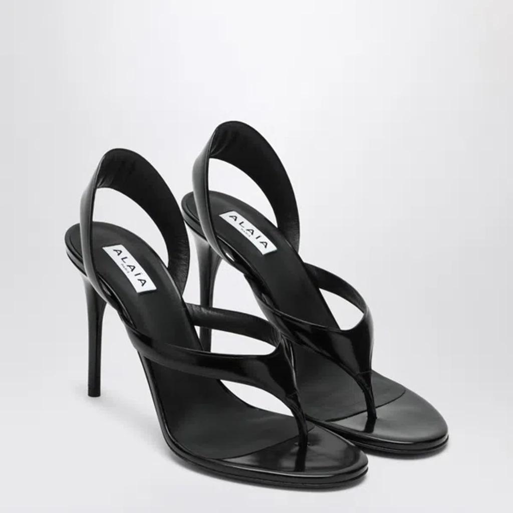 ALAÏA Leather Thong Slingback Sandals In Noir Product Image