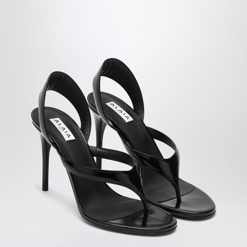 ALAÏA Leather Thong Slingback Sandals In Noir Product Image