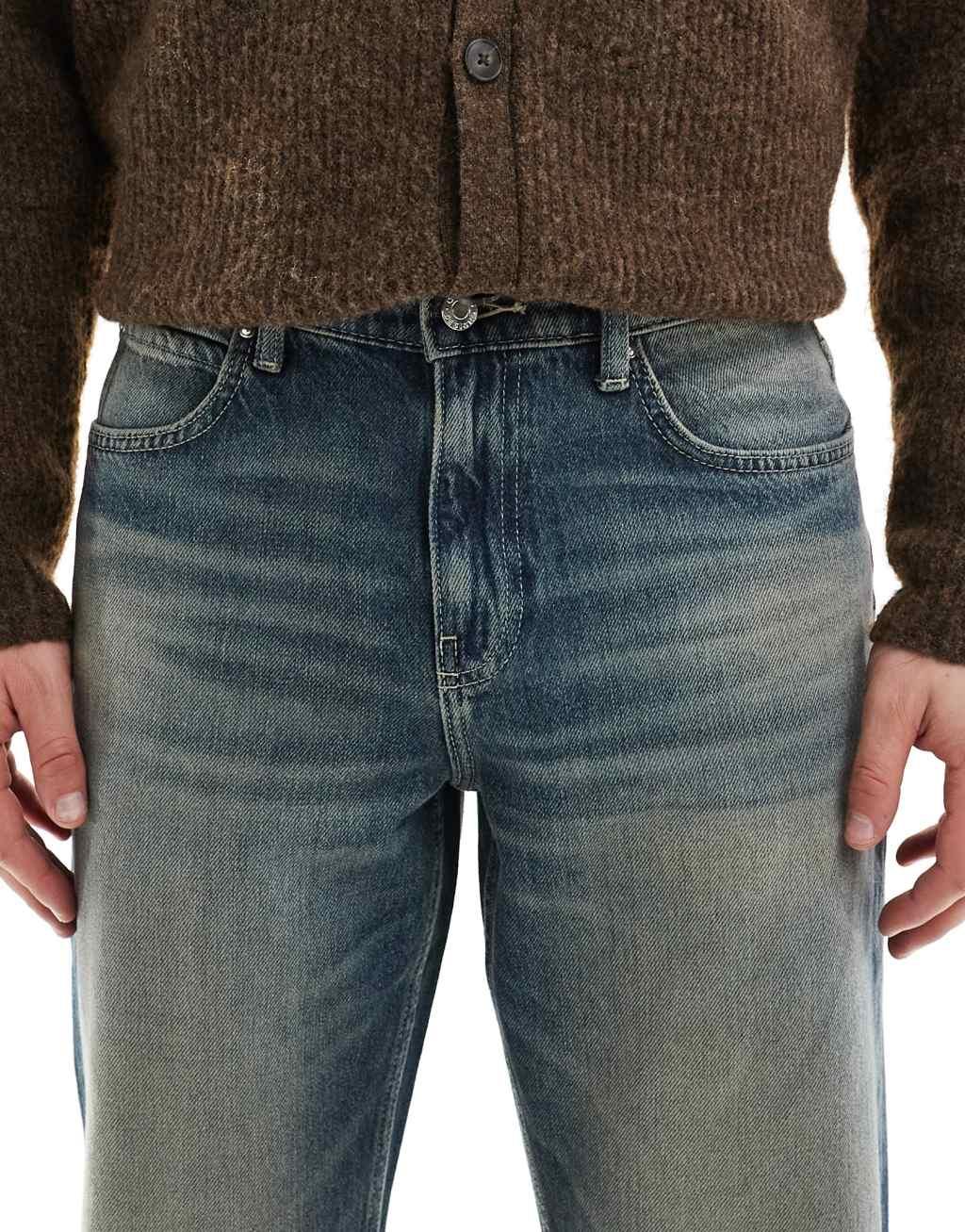 ASOS DESIGN wide flare jeans with tint in mid wash blue Product Image