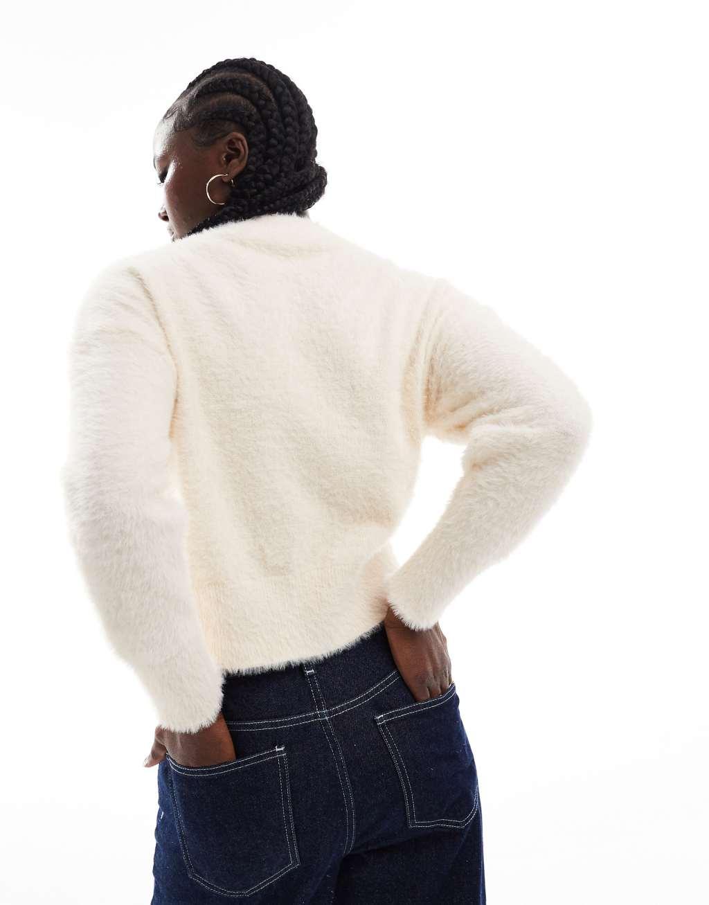 Vero Moda fluffy knitted cardigan in cream Product Image