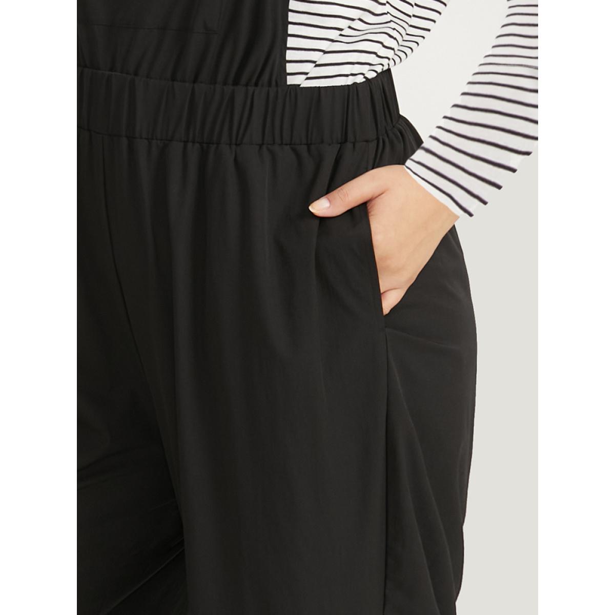 Plus Size Black Solid Pocket Back Crisscross Elastic Waist Jumpsuit Women Casual Sleeveless Spaghetti Strap Dailywear Loose Jumpsuits BloomChic 26/4X Product Image