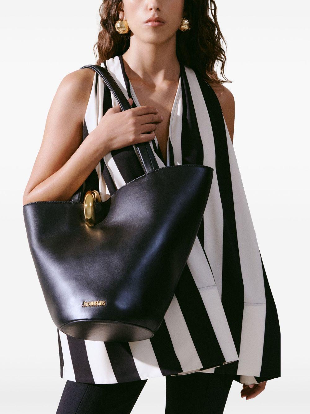 JACQUEMUS The Medium Bambola Asymmetric Leather Bucket Bag In Black 990 Product Image