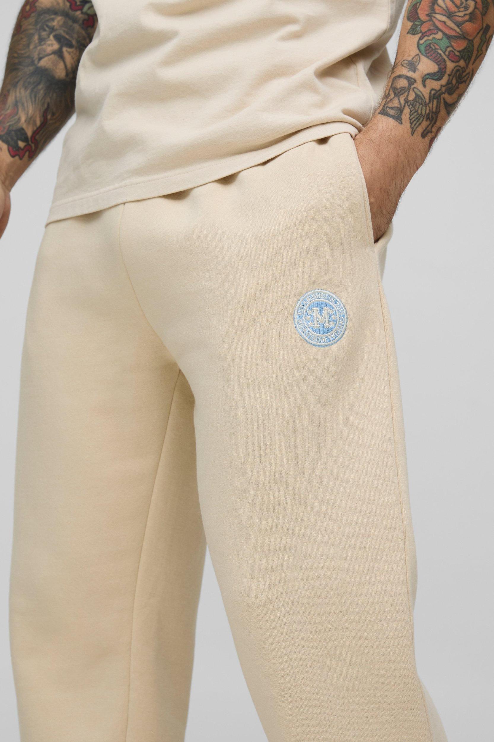Regular Fit Embroidered Split Hem Sweatpants | boohooMAN USA Product Image
