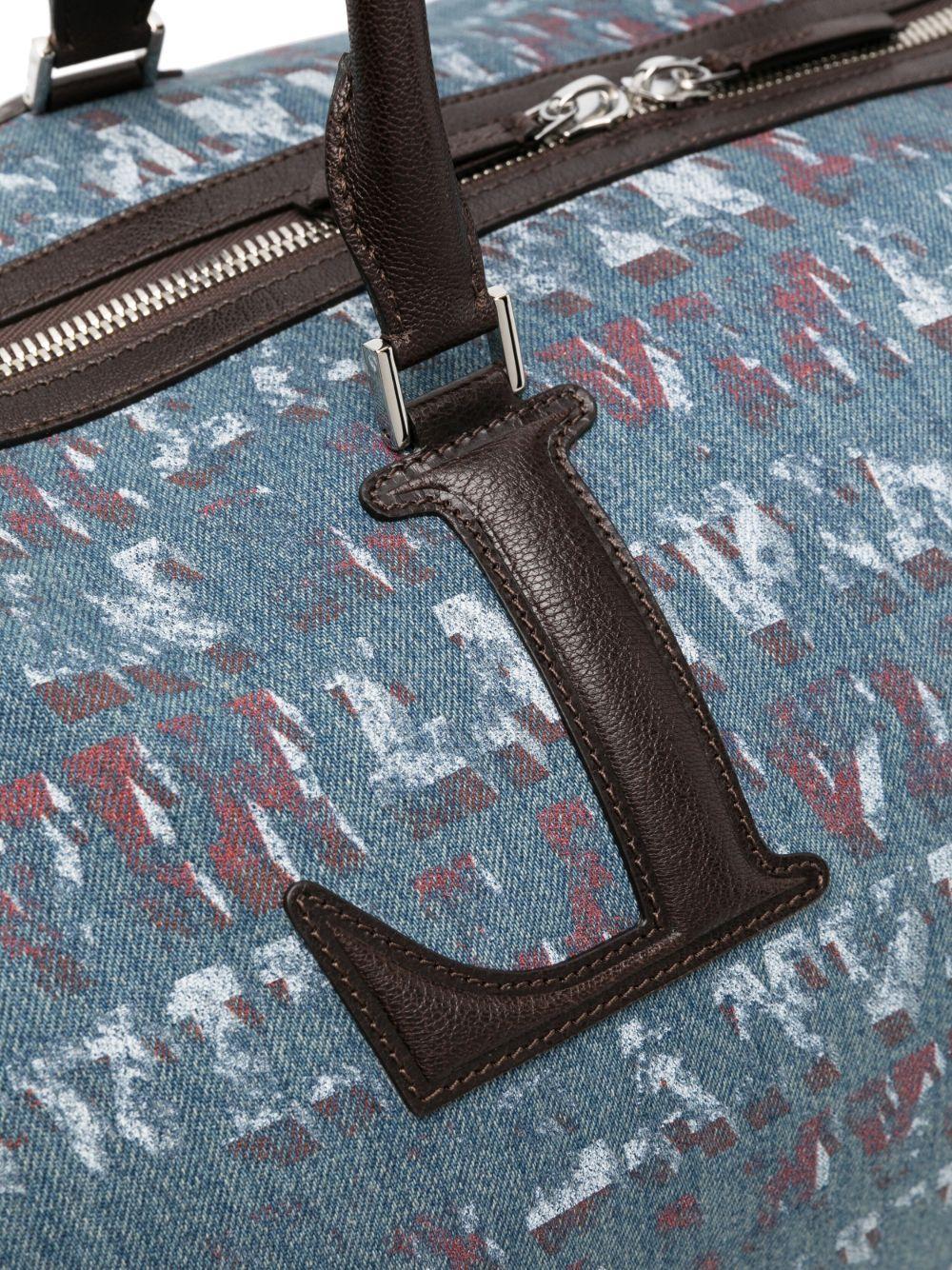 x Future monogram-pattern denim holdall Product Image