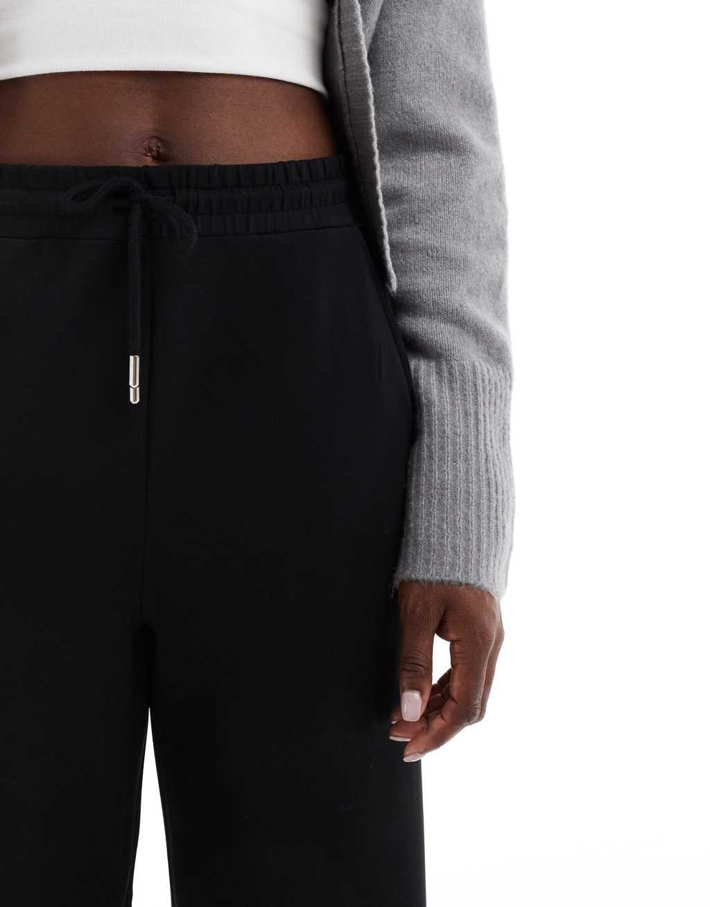 Stradivarius soft touch flare sweatpants in black Product Image