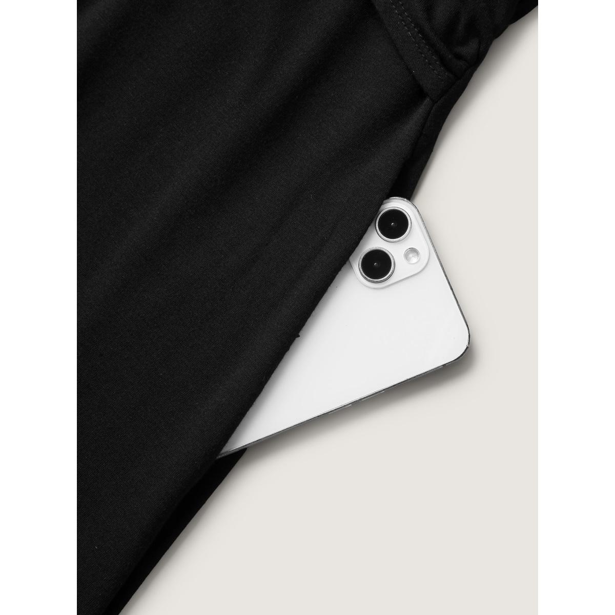 Plus Size Overlap Bodice Solid Knit Pockets Midi Dress Black Women Leisure Overlap Collar Short sleeve Curvy BloomChic 12/L Product Image