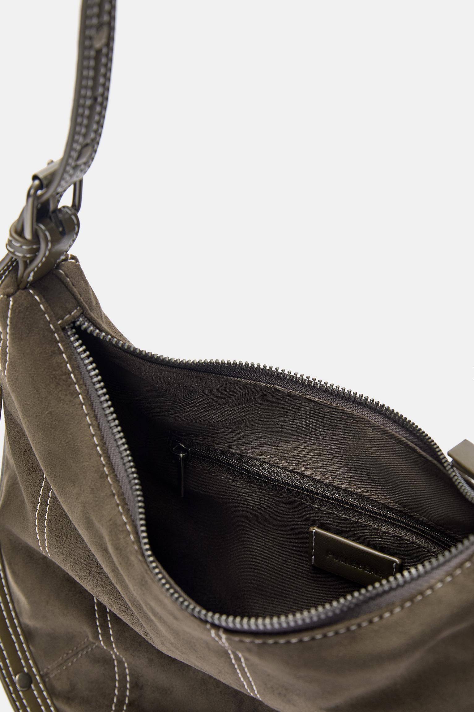 Crossbody bag with straps and topstitching Product Image