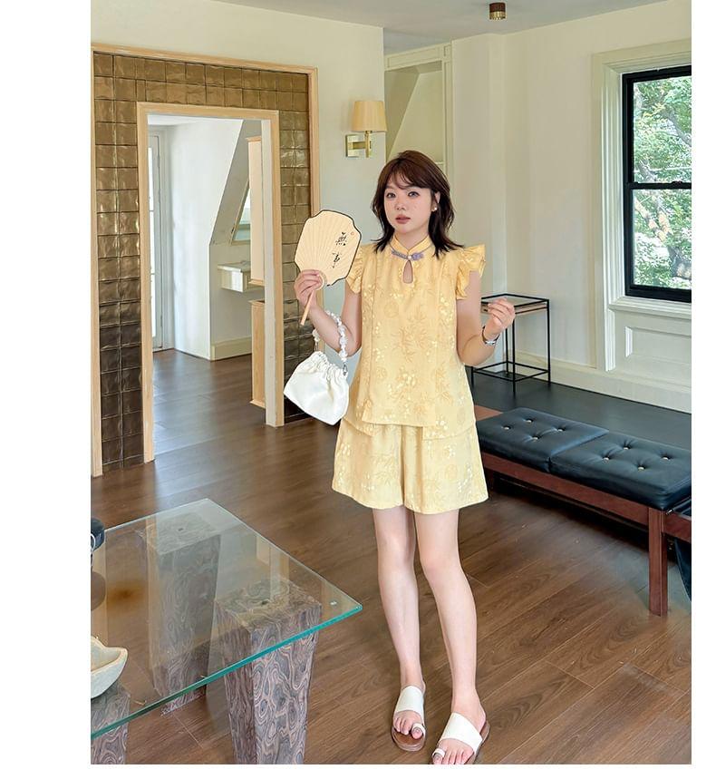 Plus Size Cap-Sleeve Stand Collar Floral Print Cutout Frog Buttoned Blouse Product Image