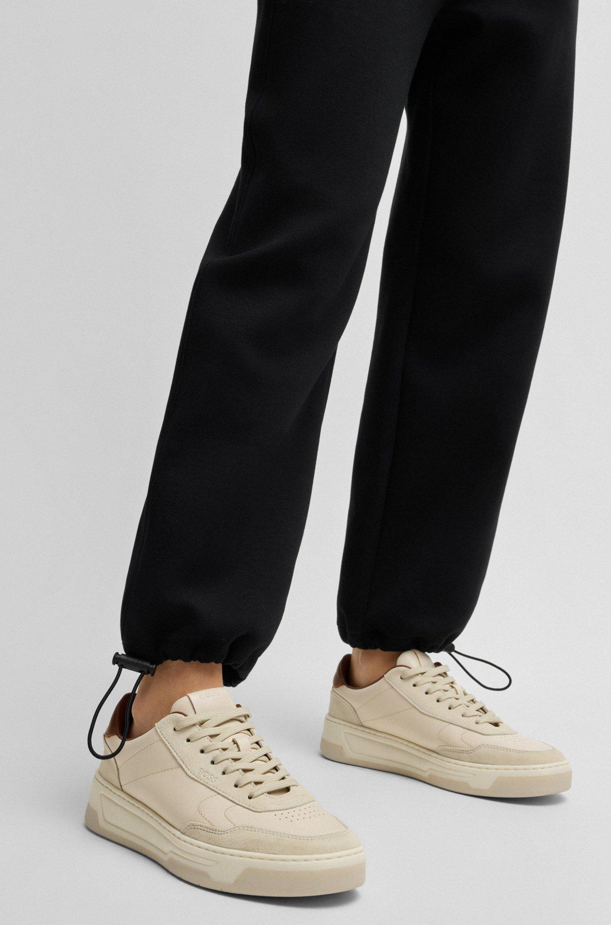 BOSS - Tracksuit bottoms with adjustable hems - Black Product Image