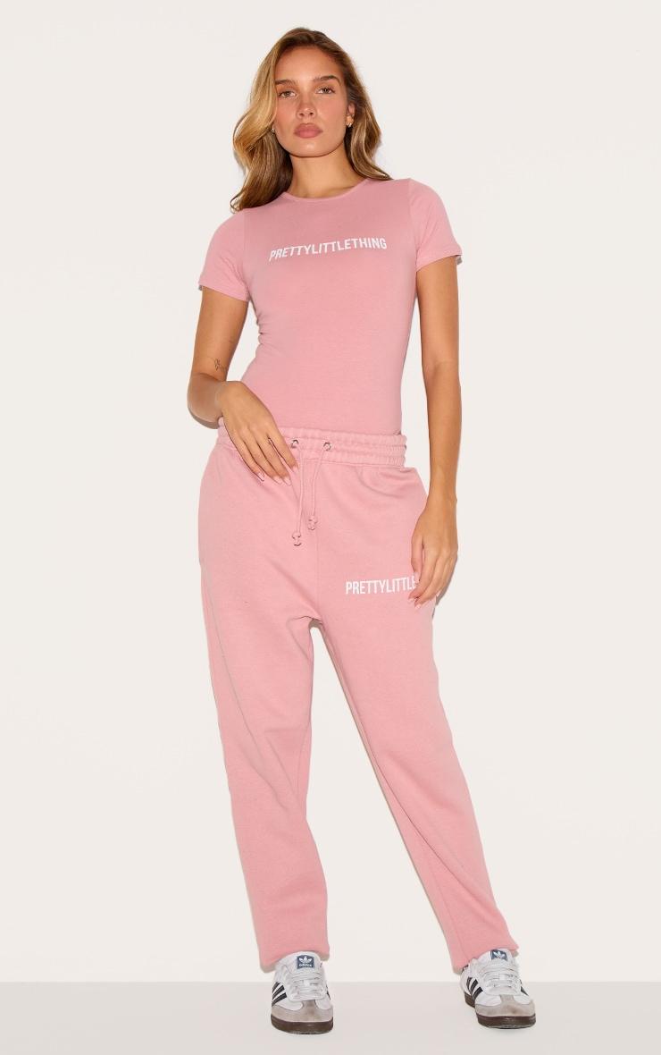 PRETTYLITTLETHING Light Pink Logo Short Sleeve Bodysuit Product Image