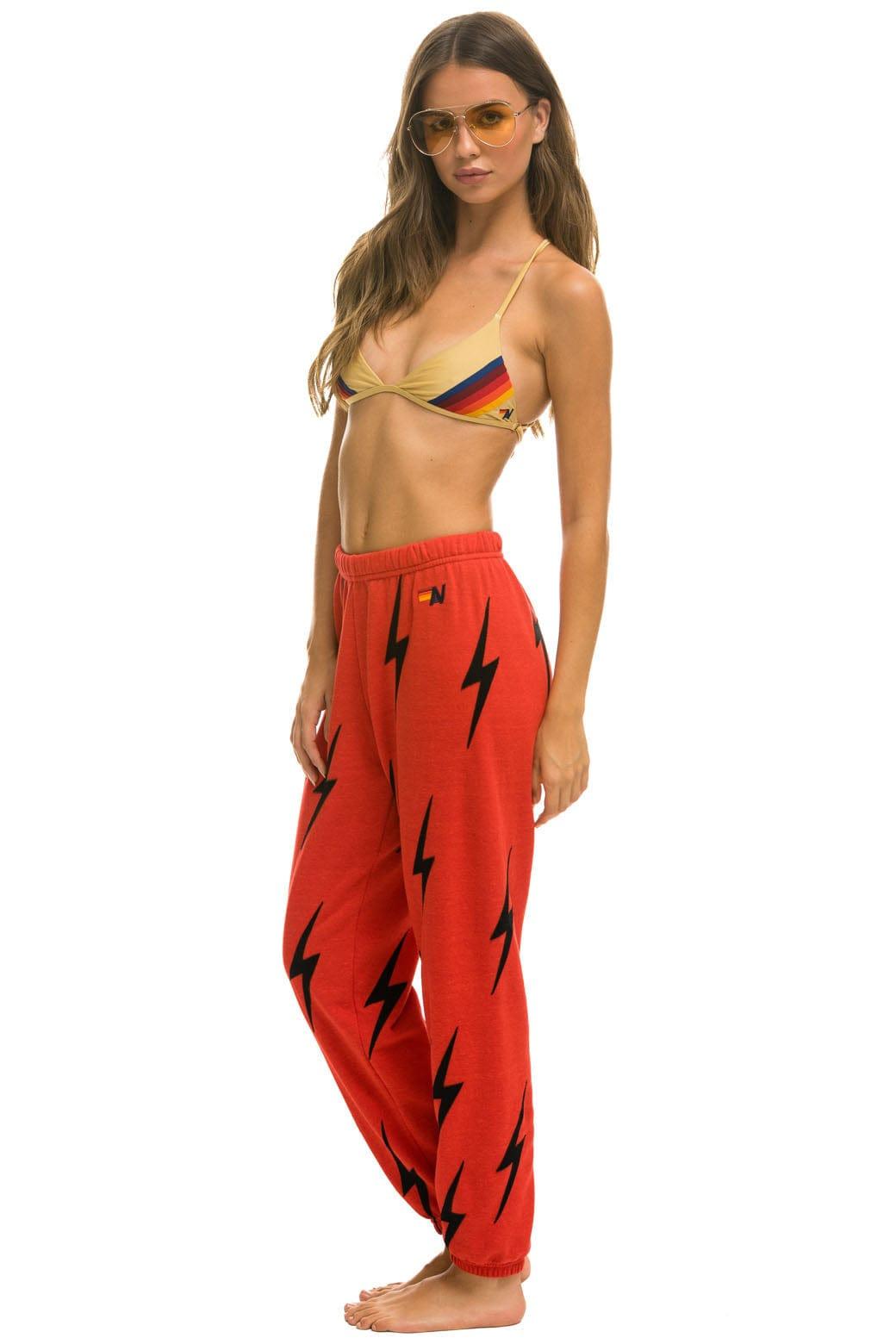 BOLT STITCH REPEAT SWEATPANTS - RED // BLACK Female Product Image