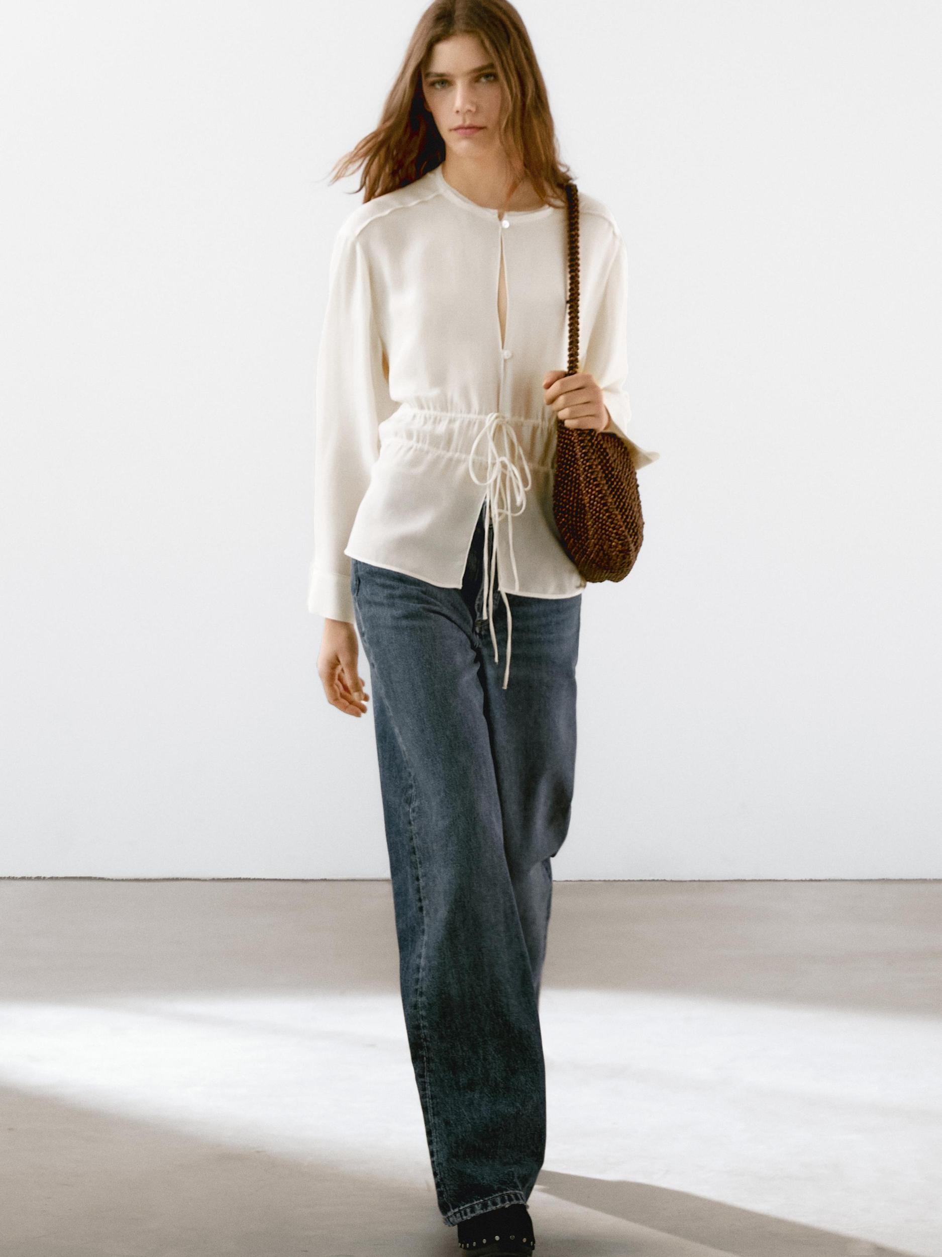 Flowing semi-sheer blouse with ties Product Image