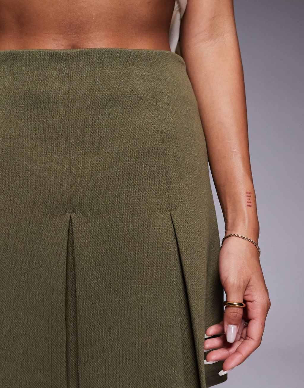 ASOS DESIGN pleated jersey twill mini skirt in Khaki Product Image