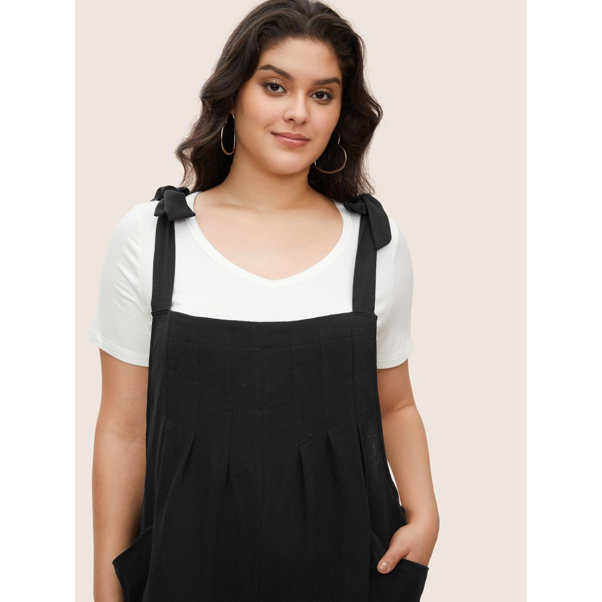 Plus Size Black Solid Pleated Detail Pocket Knotted Shoulder Overall Jumpsuit Women Casual Sleeveless Non Everyday Loose Jumpsuits BloomChic 26/4X Product Image