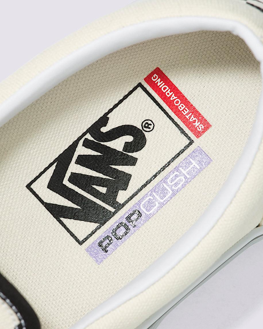 Skate Slip-On Checkerboard Shoe in Black / Off White| Vans US Product Image
