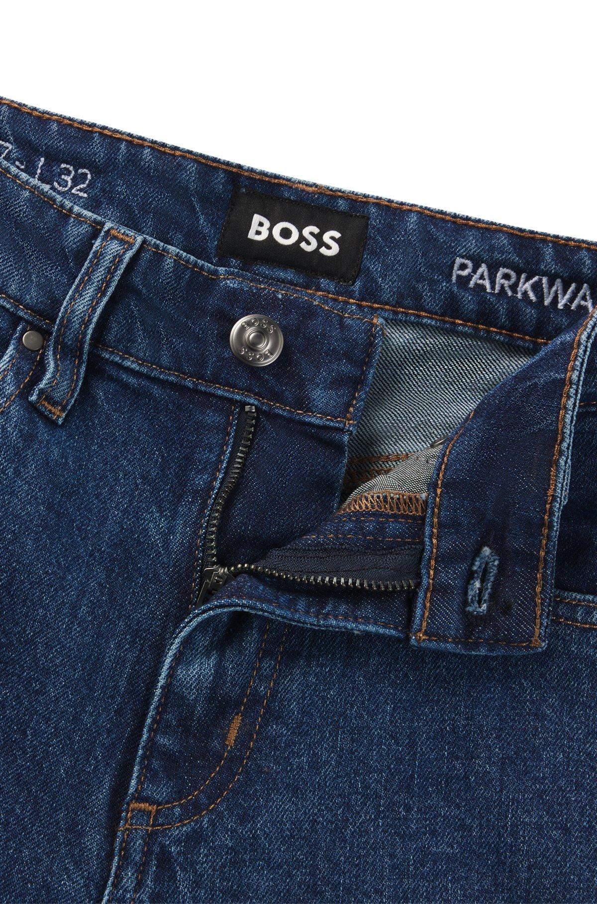 Slim-fit jeans in deep-blue comfort-stretch denim Product Image