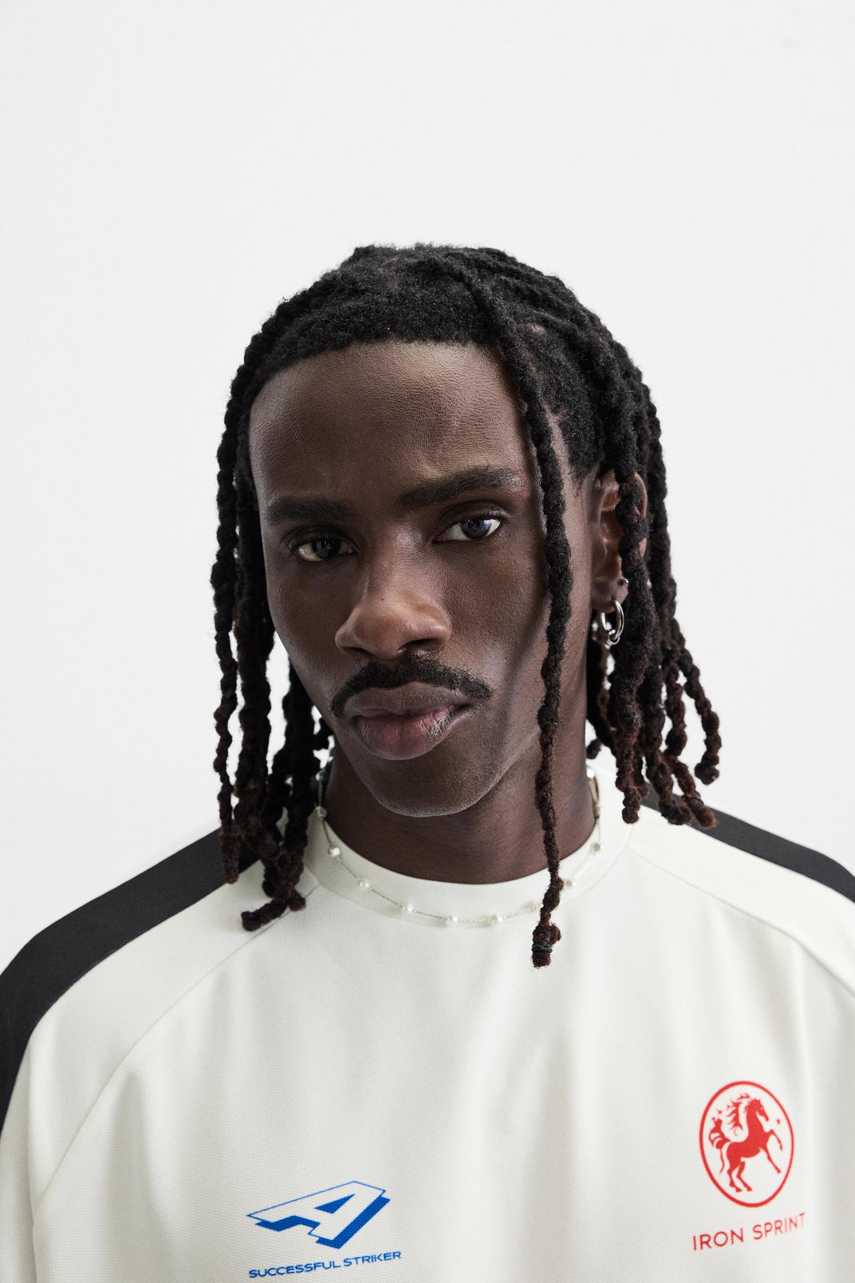 COLOR BLOCK TEXT T-SHIRT Product Image