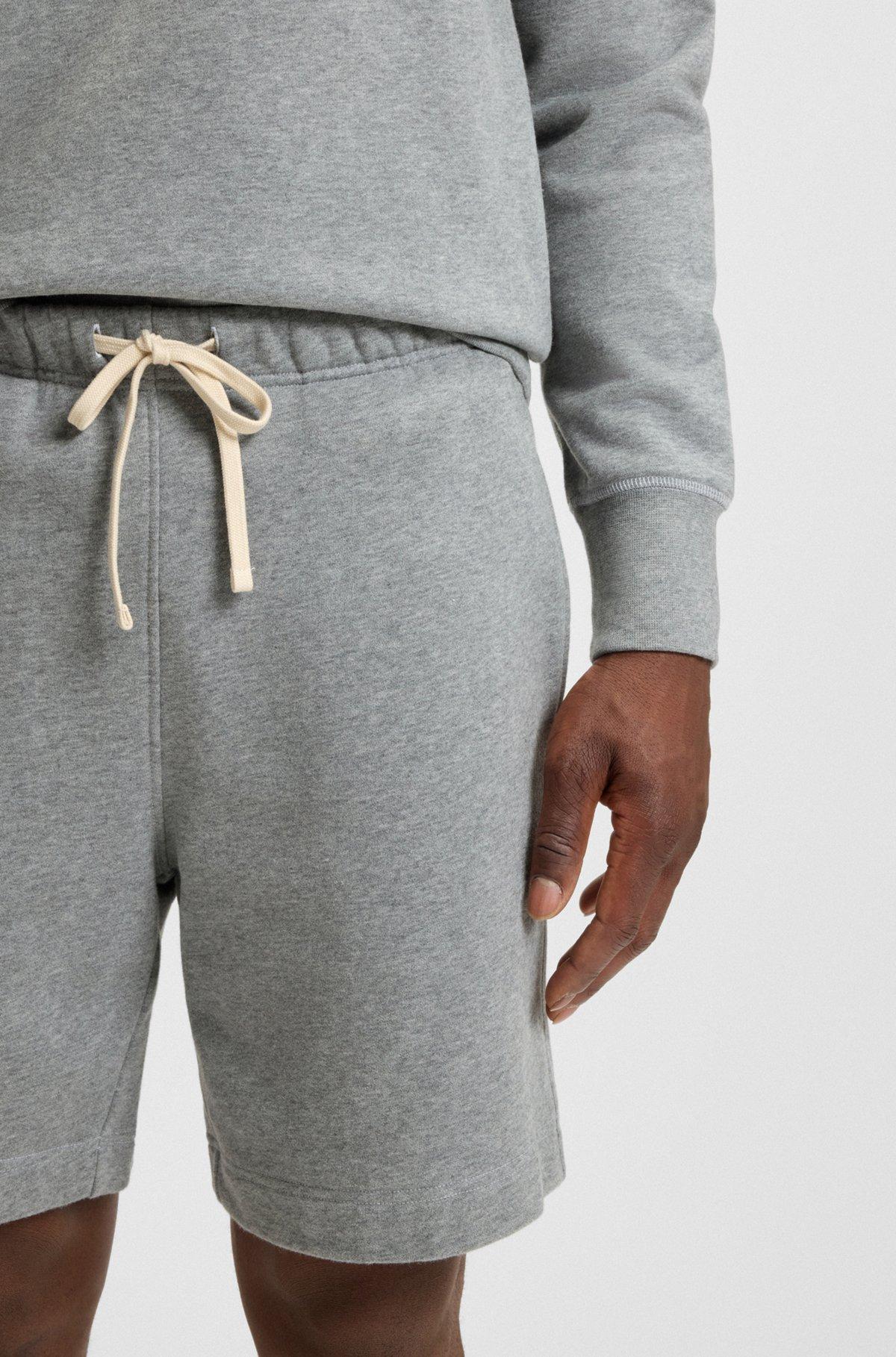 BOSS - BECKHAM x BOSS oversized-fit shorts in cotton terry - Black Product Image