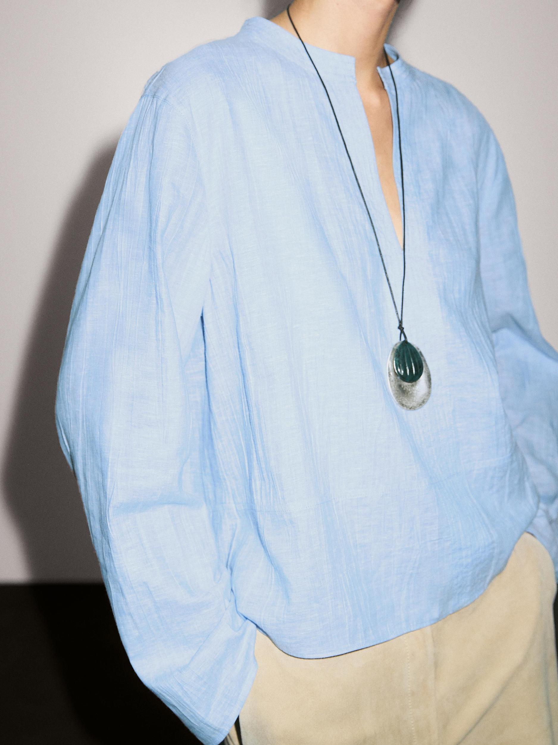 Linen blend blouse with seam details Product Image