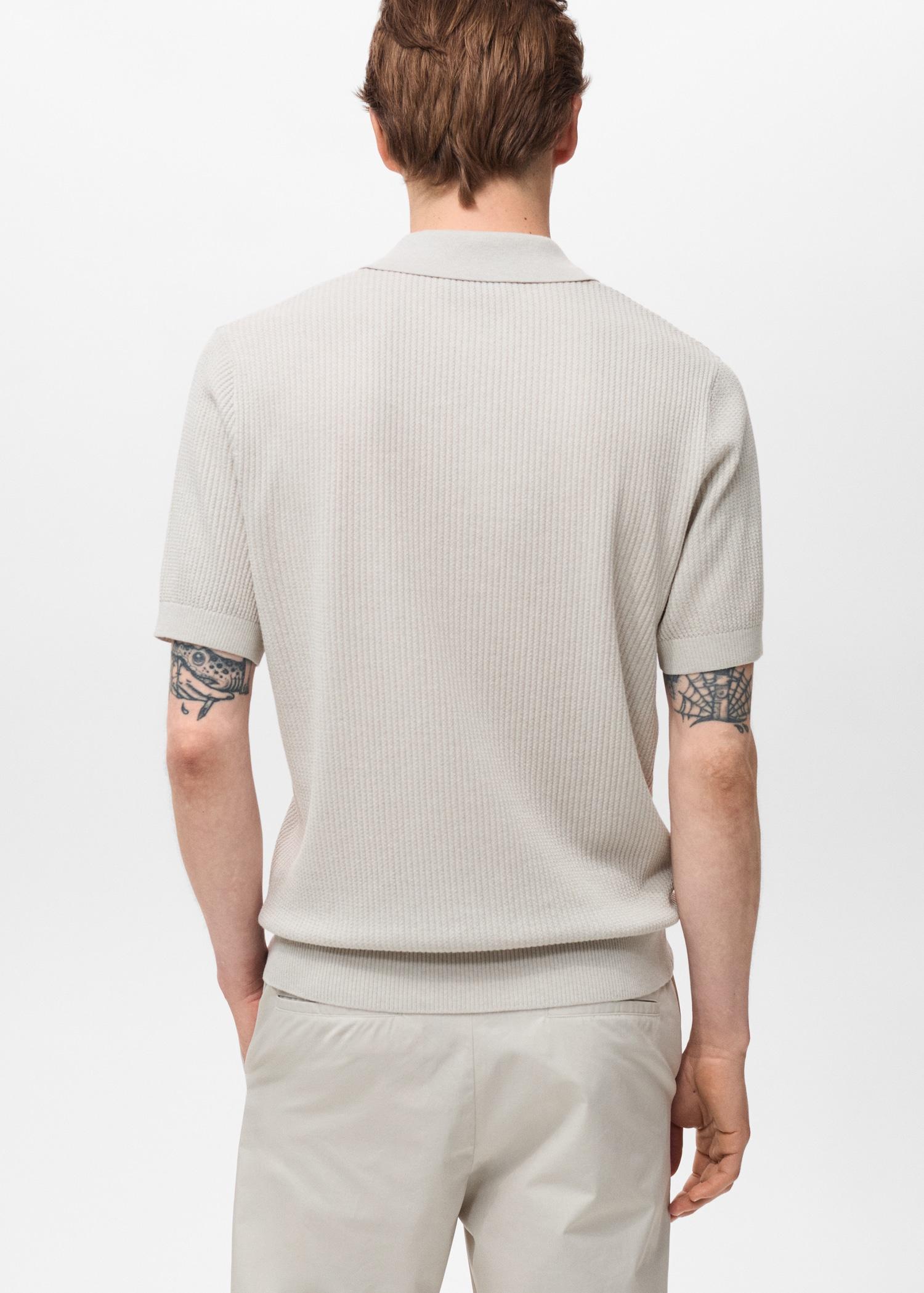 Ribbed knit polo shirt - Men | MANGO USA Product Image