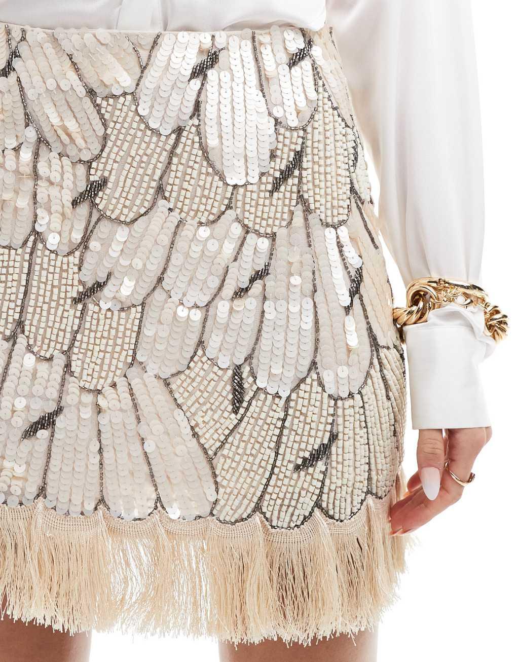 ASOS DESIGN sequin mini skirt with fringe hem in cream Product Image
