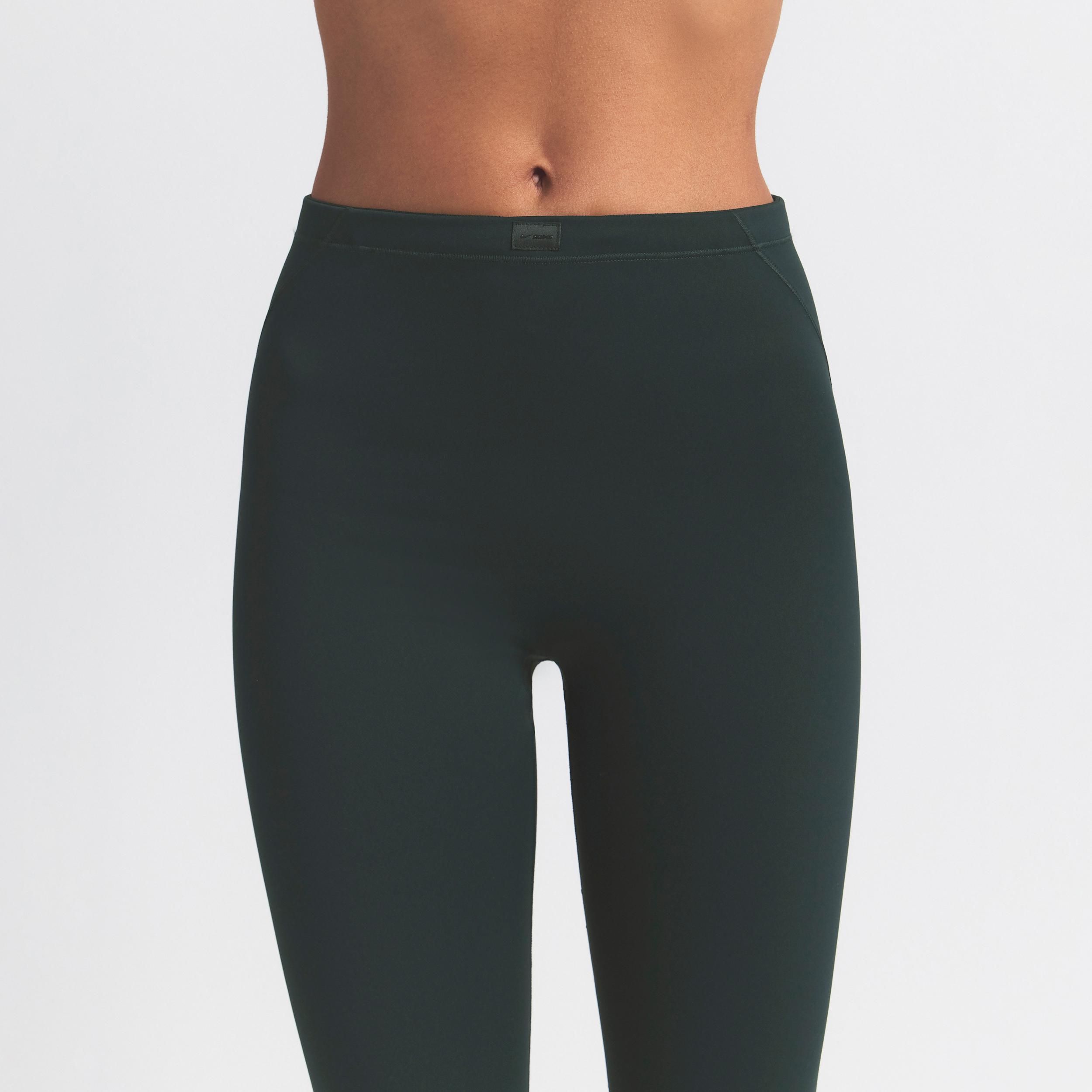 Nike Women's SKIMS Matte High-Waisted Footsie Grip Leggings Product Image
