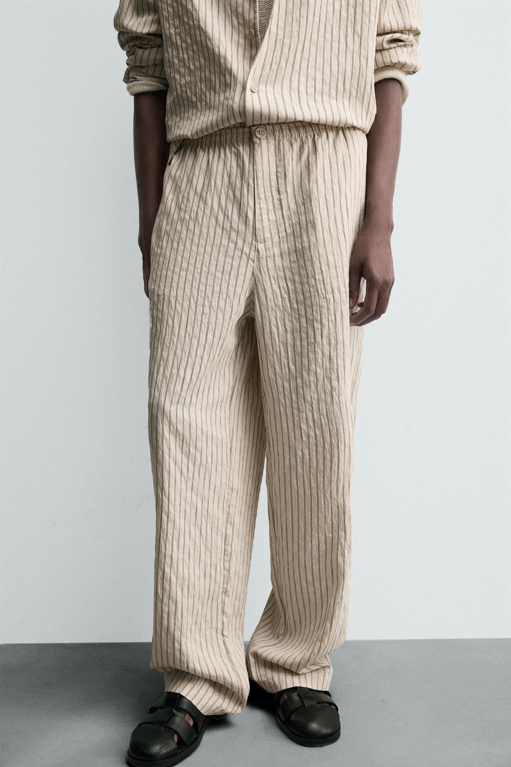 WRINKLED EFFECT STRIPED FLOWY PANTS Product Image