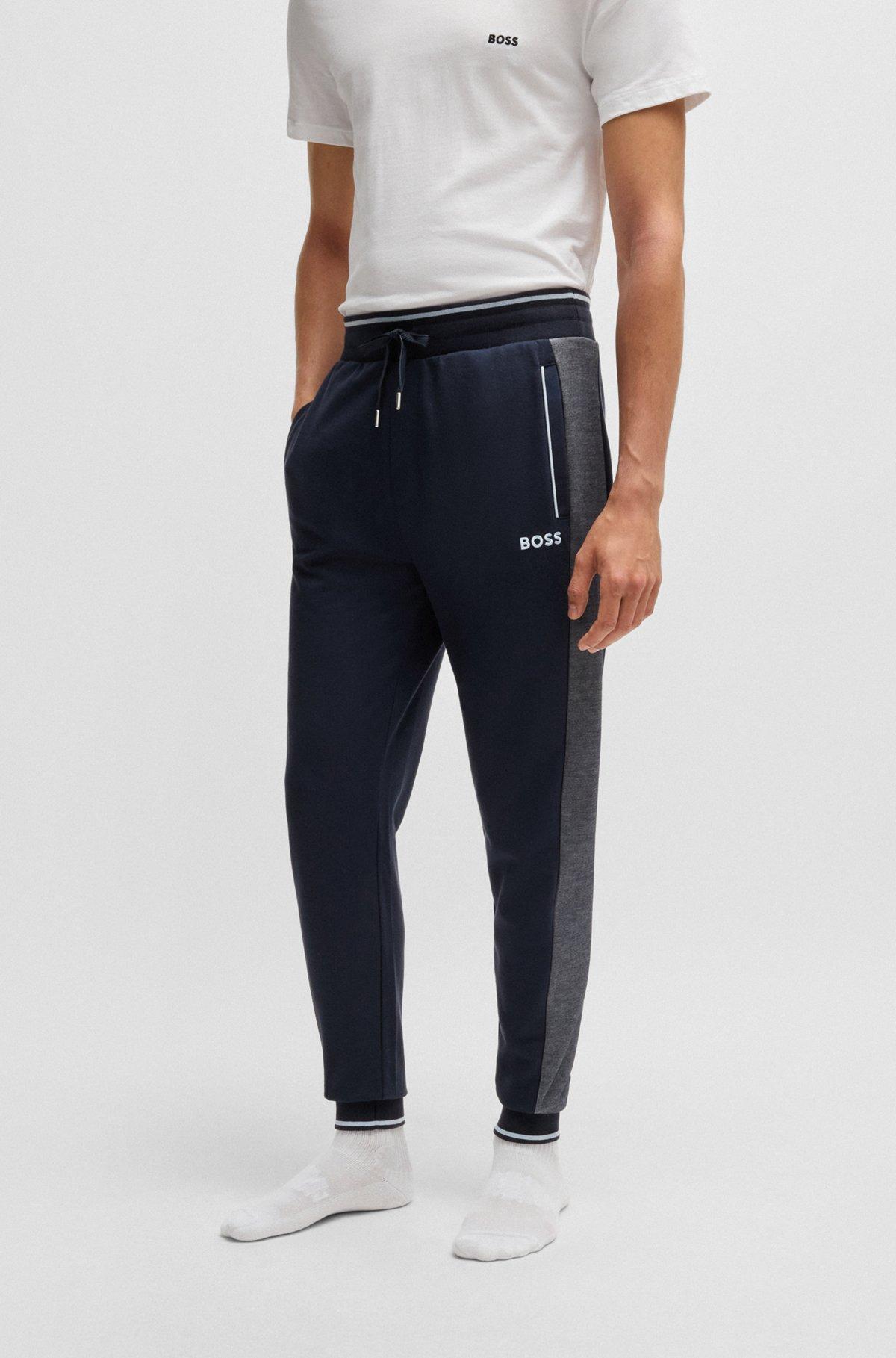 Tracksuit bottoms with contrast piping Product Image