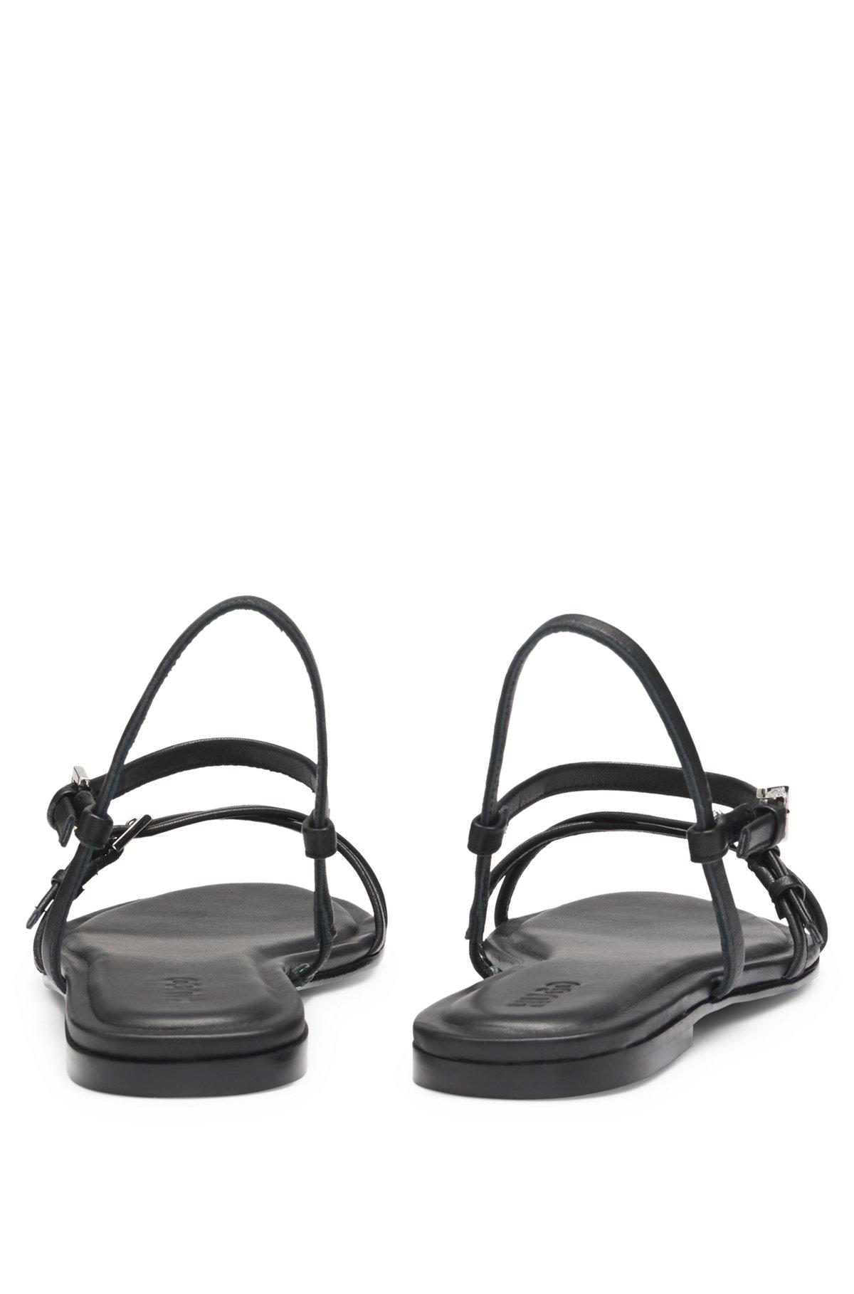 Flat sandals in nappa leather with logo buckles Product Image