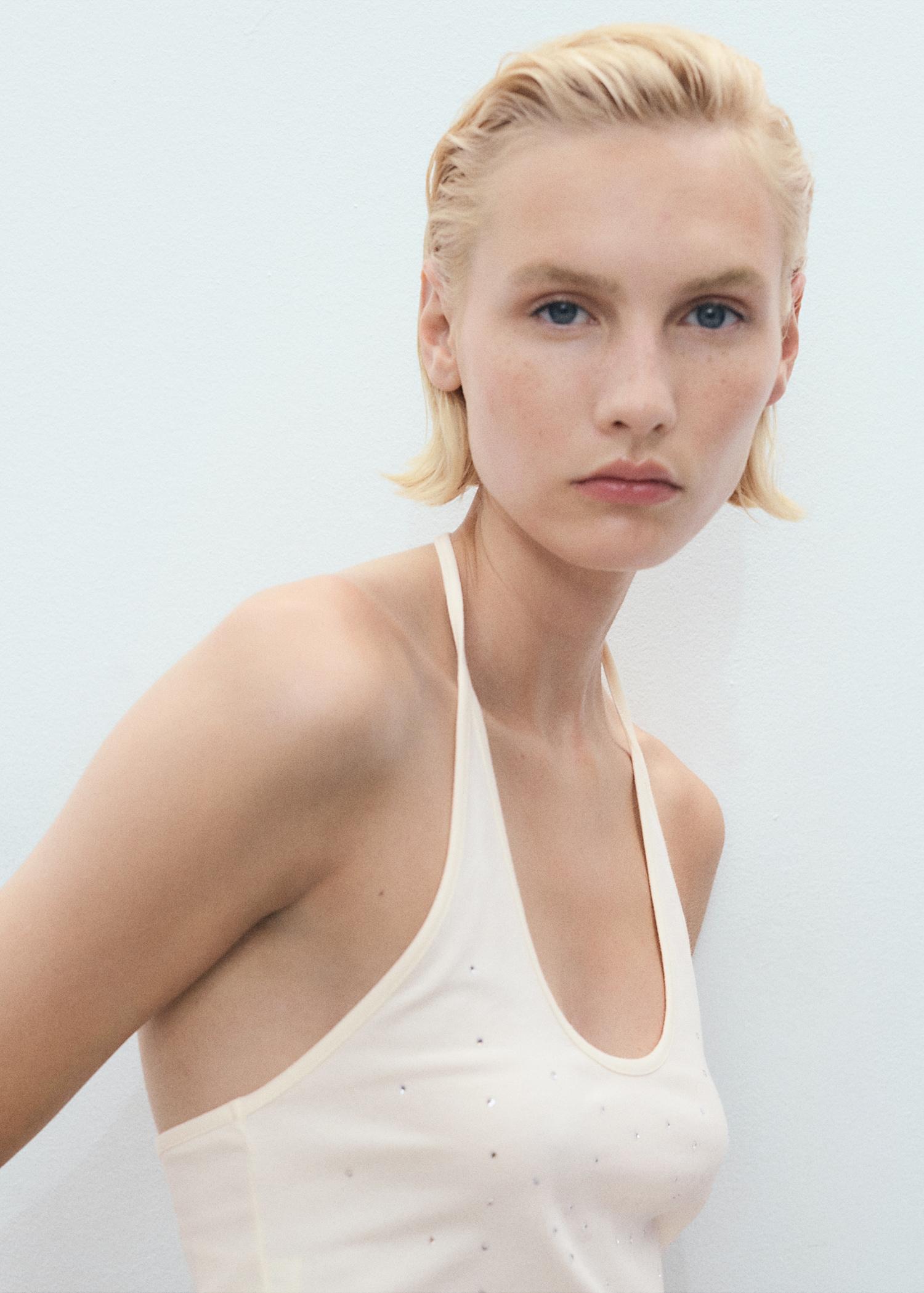 Halter neck top with metallic appliqués - Women | MANGO USA Product Image