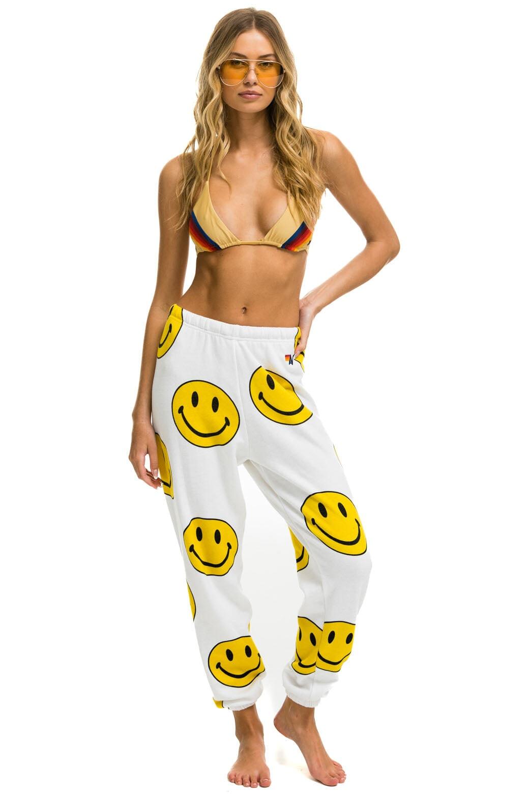SMILEY REPEAT SWEATPANTS - WHITE Female Product Image