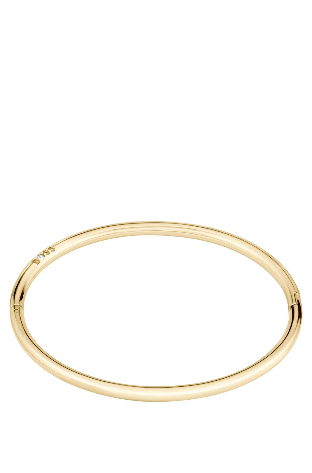 Gold-tone bangle with logo detail Product Image