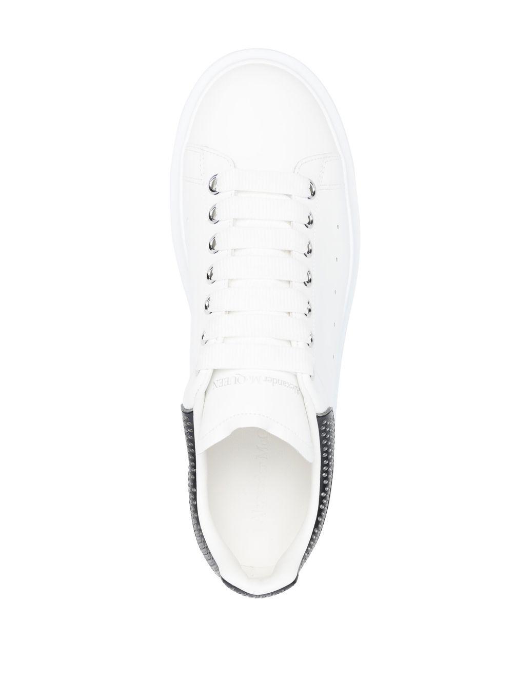 Oversized low-top leather sneakers Product Image