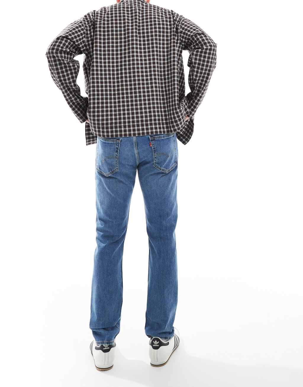 Levi's 502 tapered fit jeans in mid wash Product Image