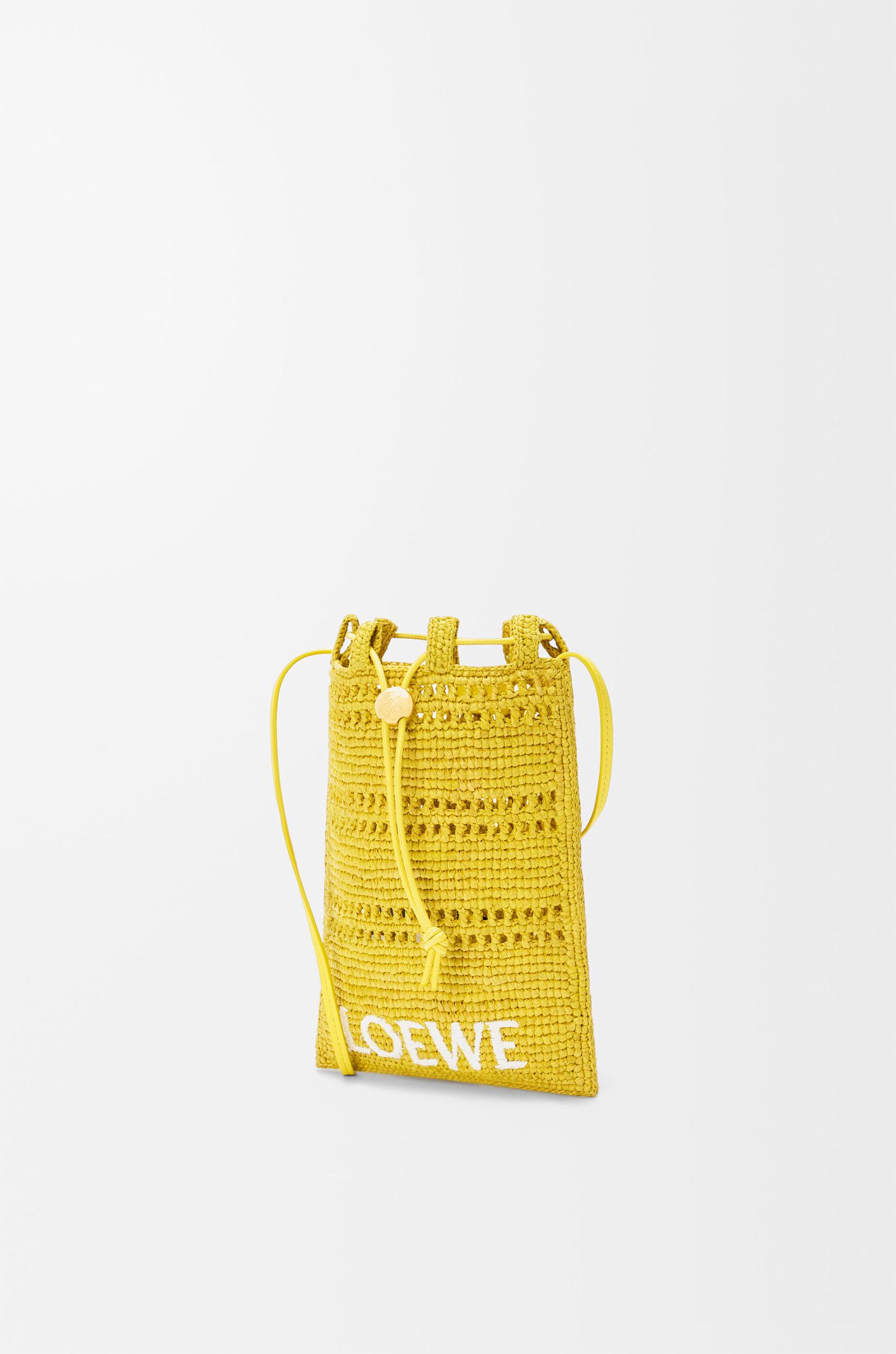 Drawstring pocket in raffia  Product Image