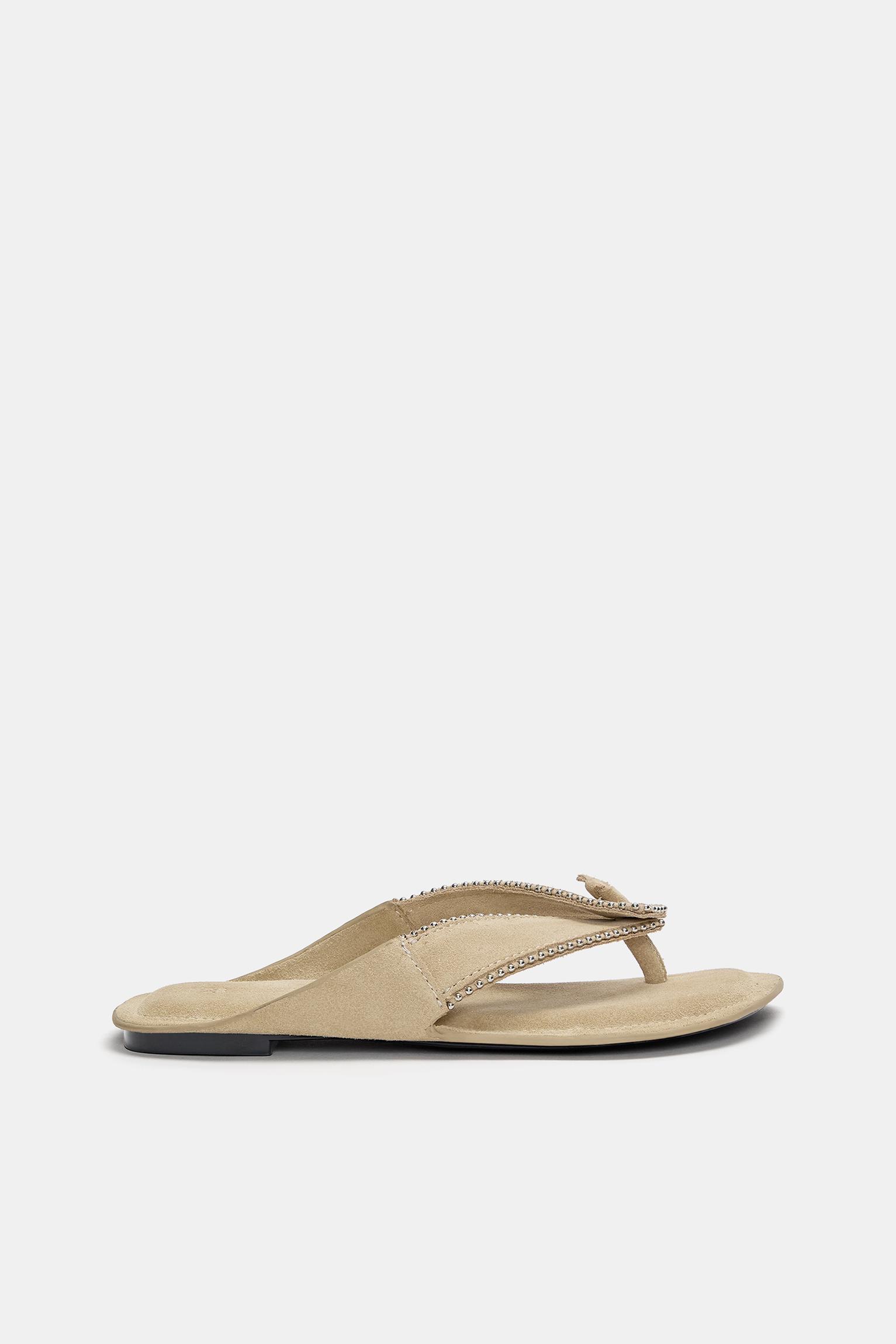 Flat sandals with leather embellishments Product Image