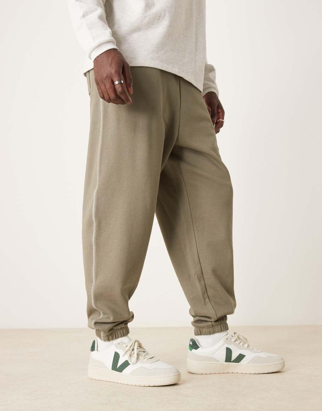 ASOS DESIGN oversized sweatpants with contrast stitching in khaki Product Image