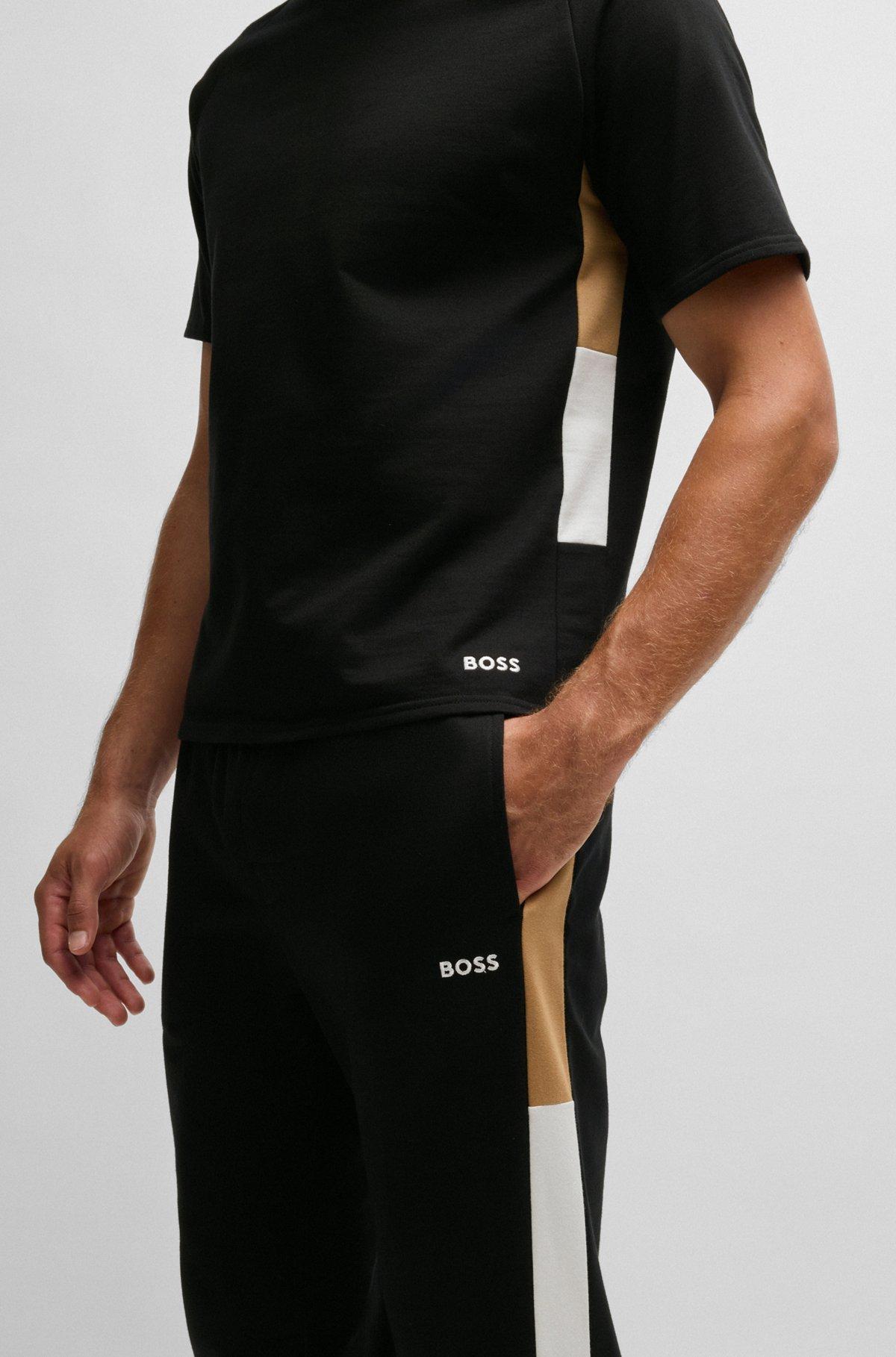 Cotton-terry tracksuit bottoms with contrast side panels Product Image