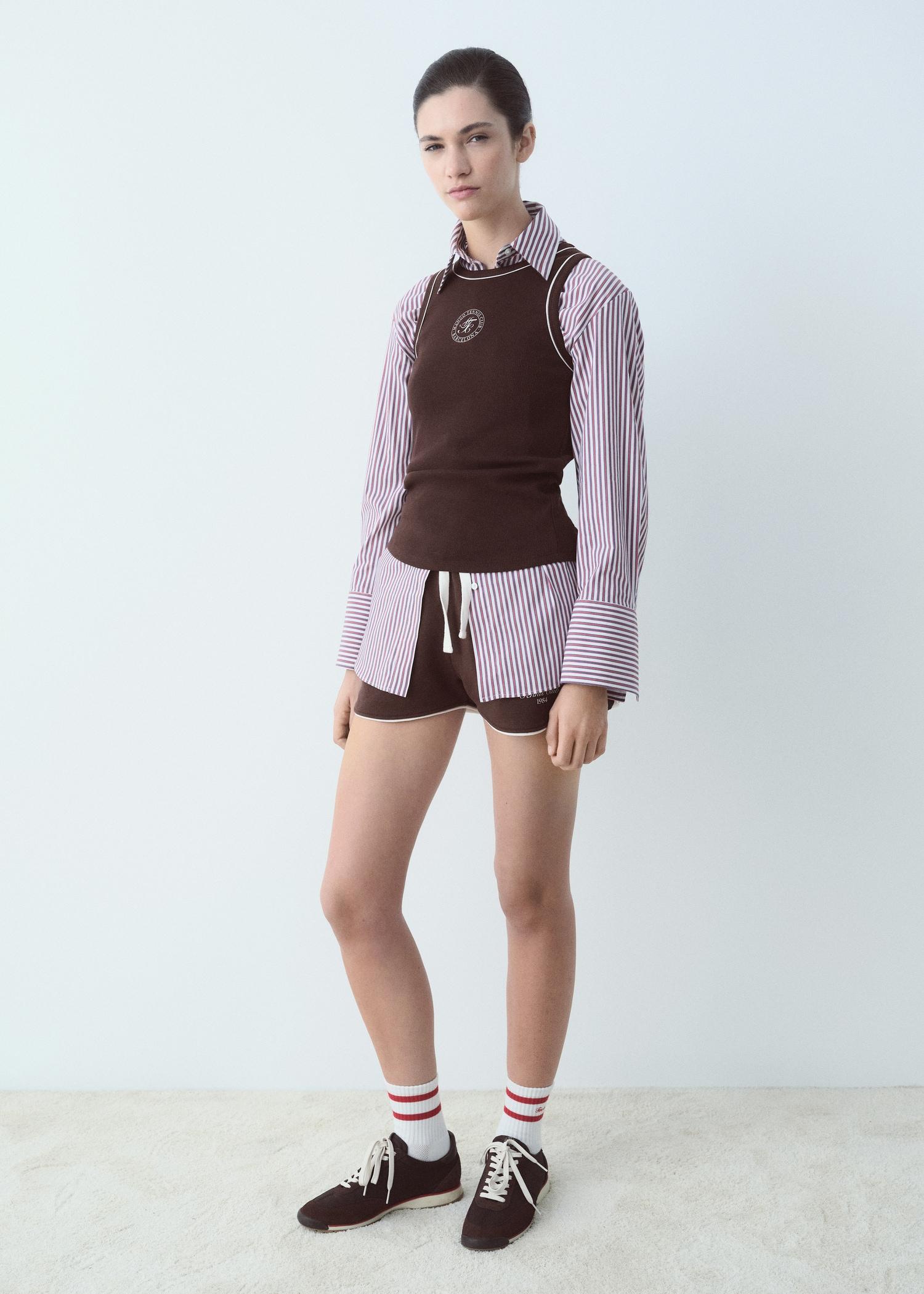 Cotton top with printed message - Women | MANGO USA Product Image