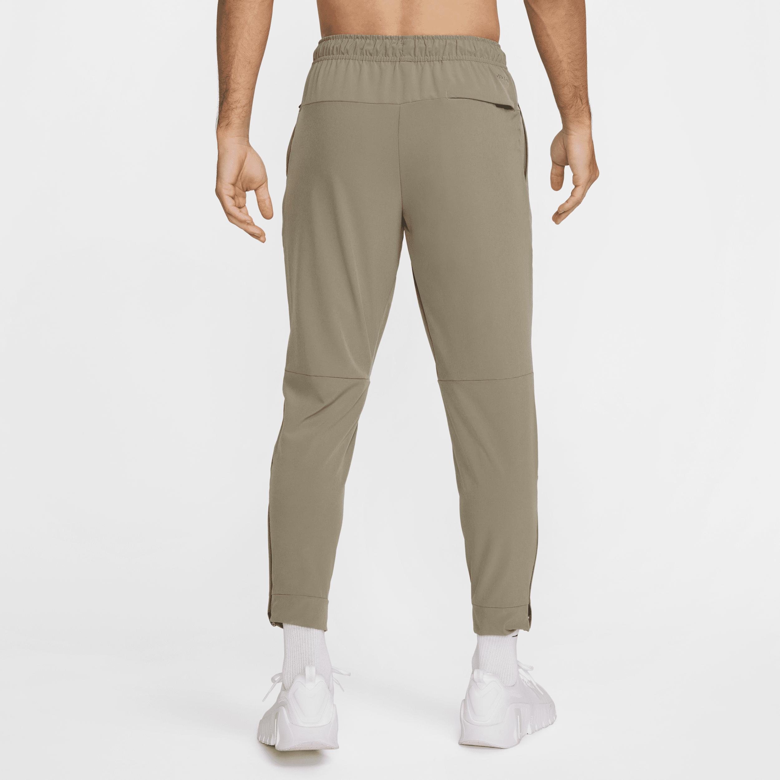 Nike Mens Unlimited Dri-FIT Zippered Cuff Versatile Pants | FB7548-320 Product Image