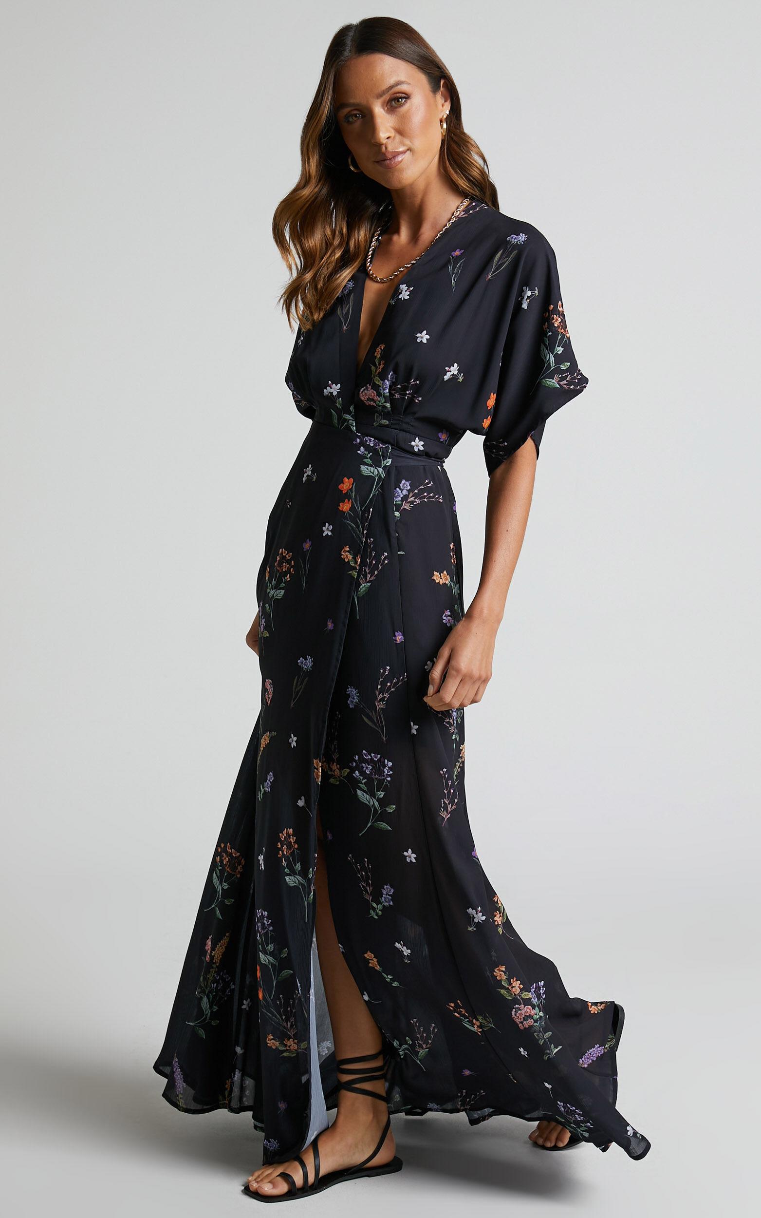 Erenza Maxi Dress - Extended Sleeve Wrap Dress in Black Flower Field Product Image