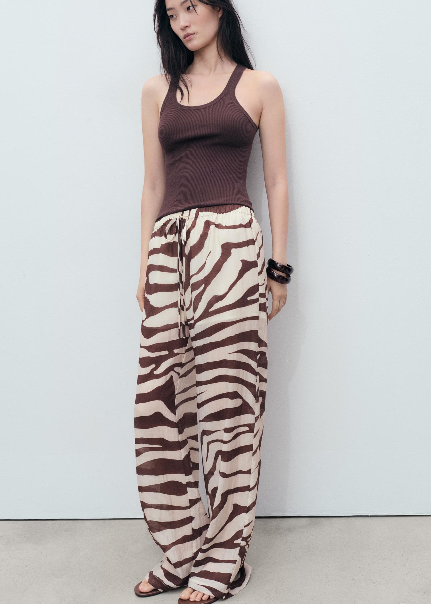 Zebra-print fluid pants - Women | MANGO USA Product Image