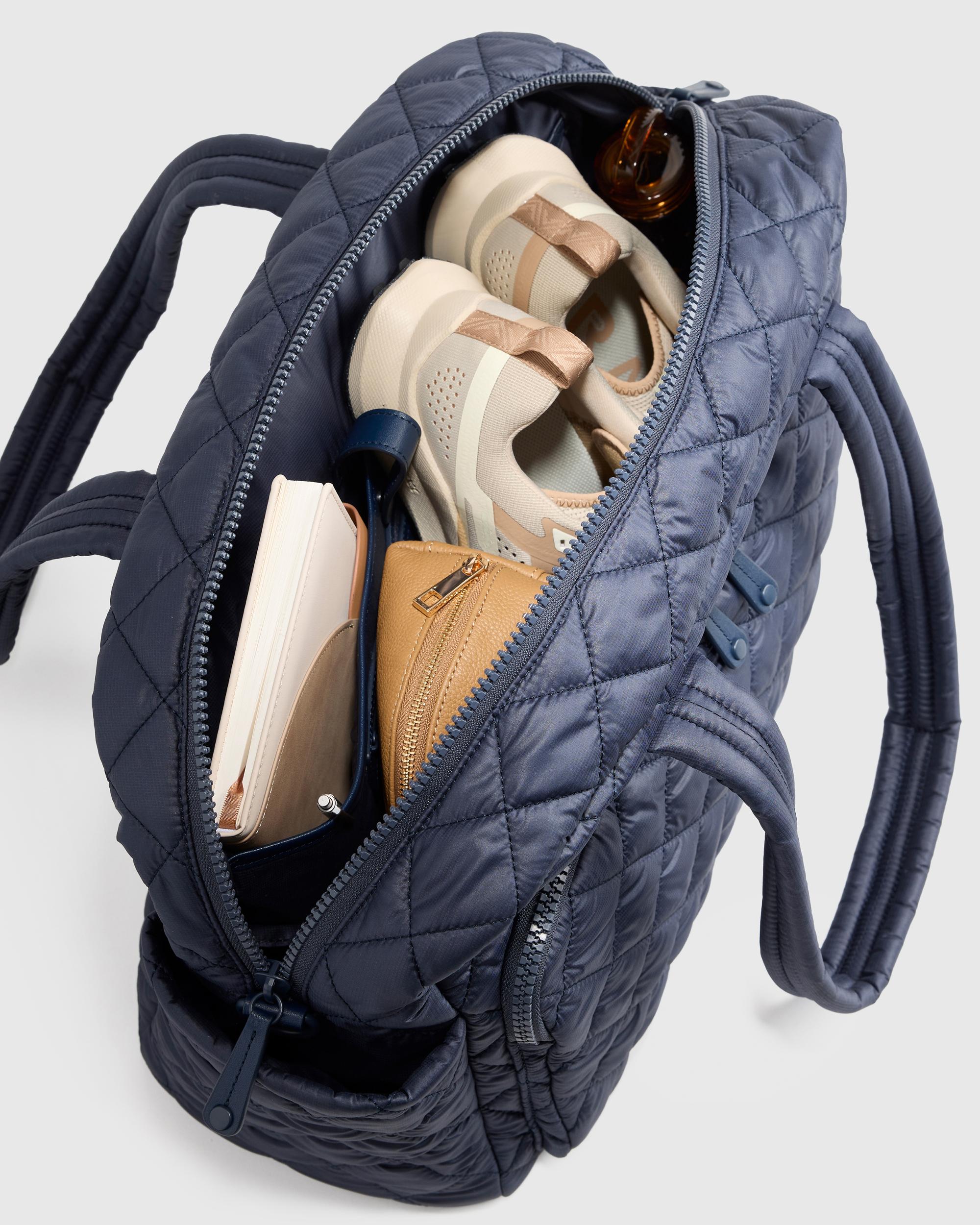 Quince | Women's Transit Quilted Duffle Bag in Navy, Nylon Product Image