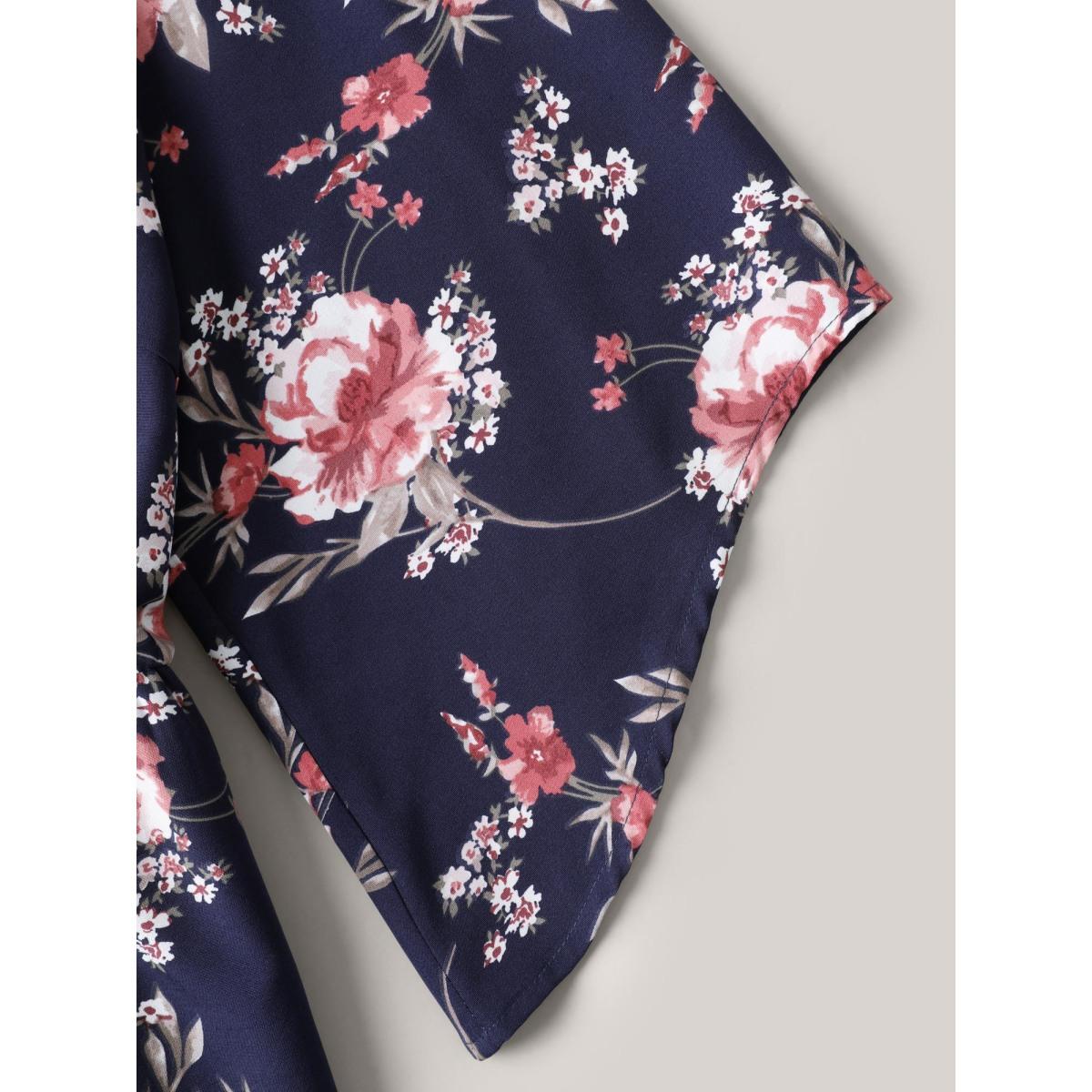 Plus Size DarkBlue Large Flower Pattern Pockets Belted Jumpsuit Women Elbow-length sleeve Overlap Collar Everyday-Elegant Loose Jumpsuits BloomChic 14-16/1X Product Image