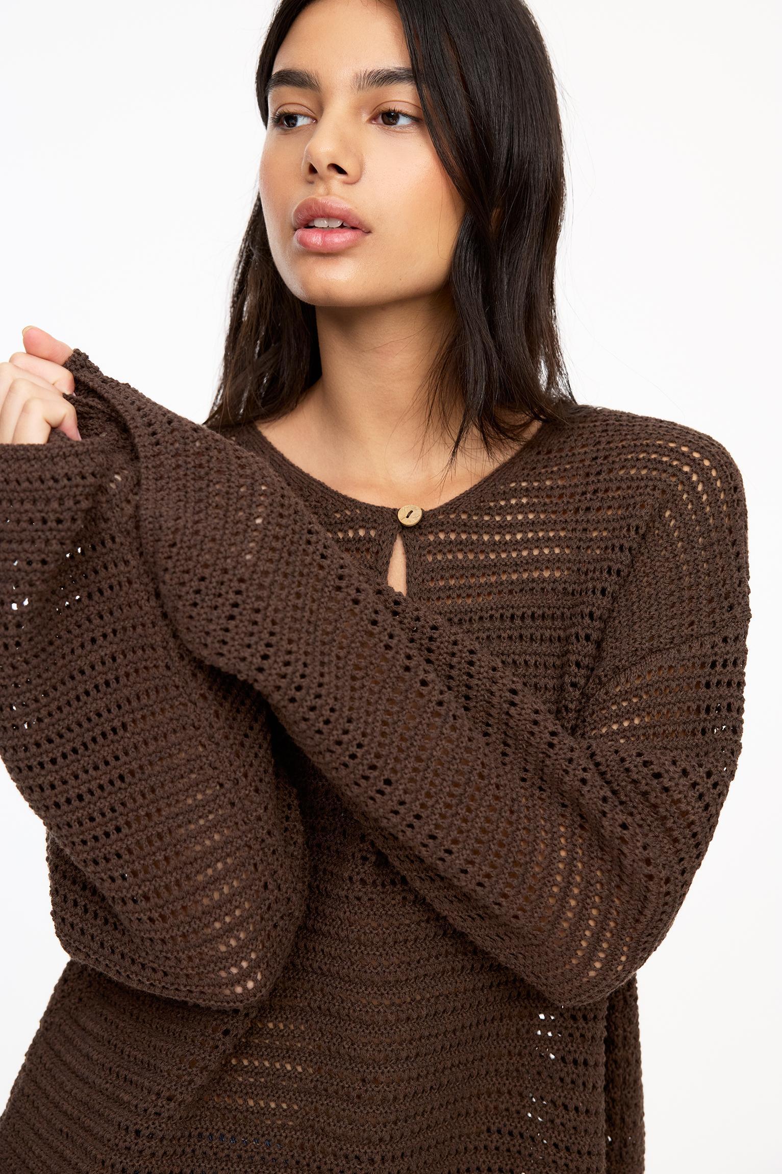 Open knit sweater with buttons Product Image